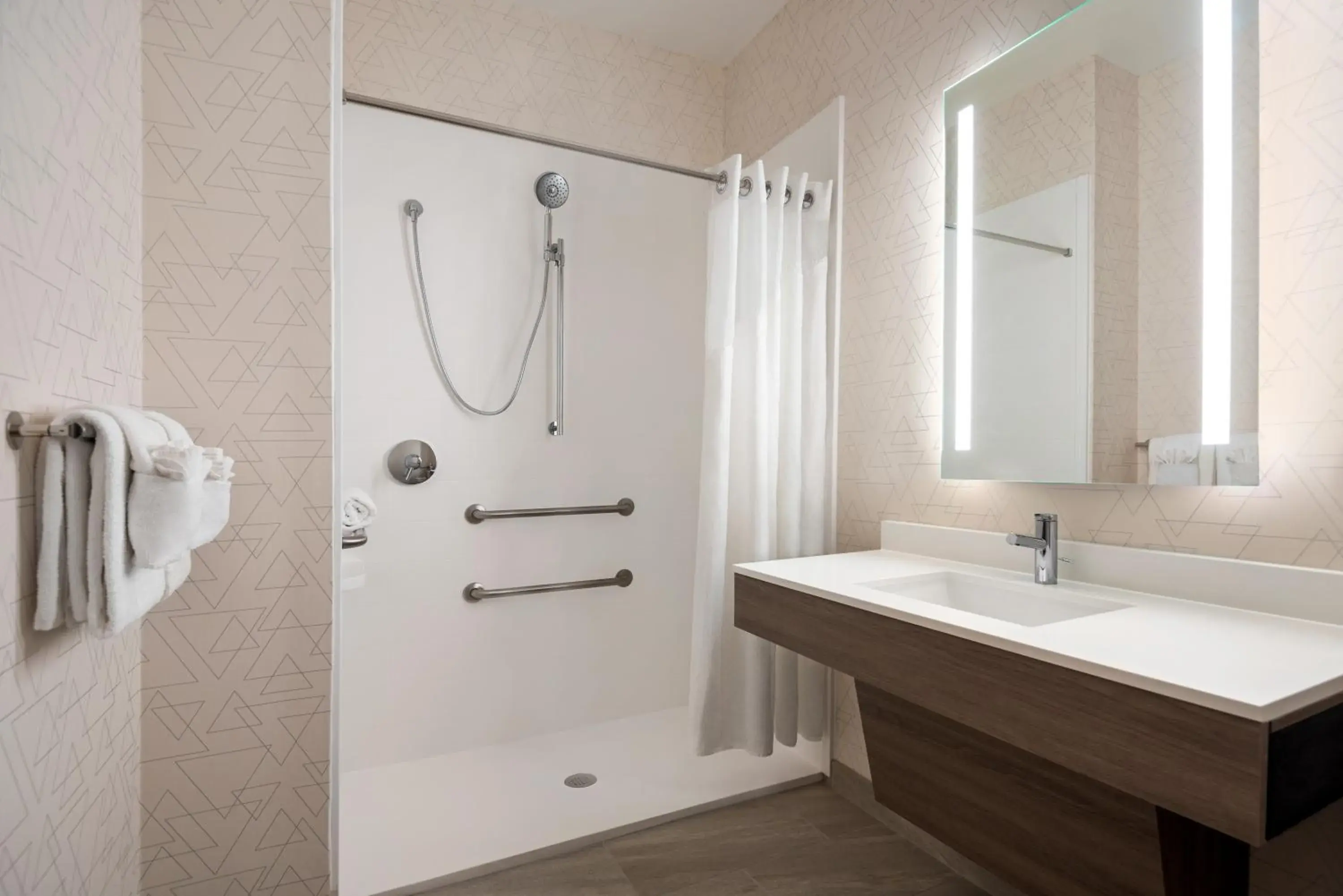 Queen Room with Two Queen Beds - Disability Access with Roll In Shower in Holiday Inn Express & Suites Mobile West I-10 by IHG Queen Room with Two Queen Beds - Disability Access with Roll In Shower in Holiday Inn Express & Suites Mobile West I-10 by IHG