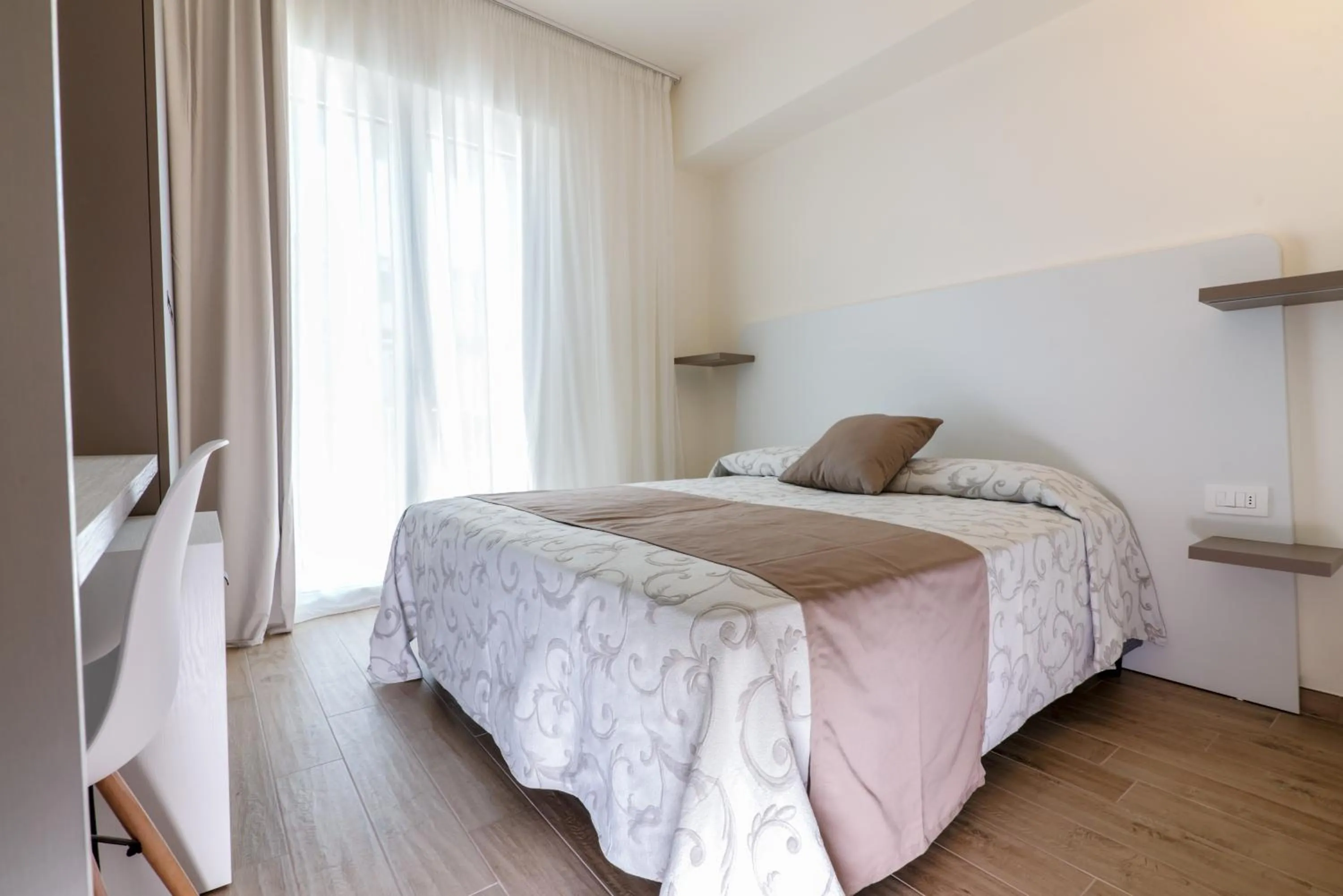 Bed in Family Hotel Relax