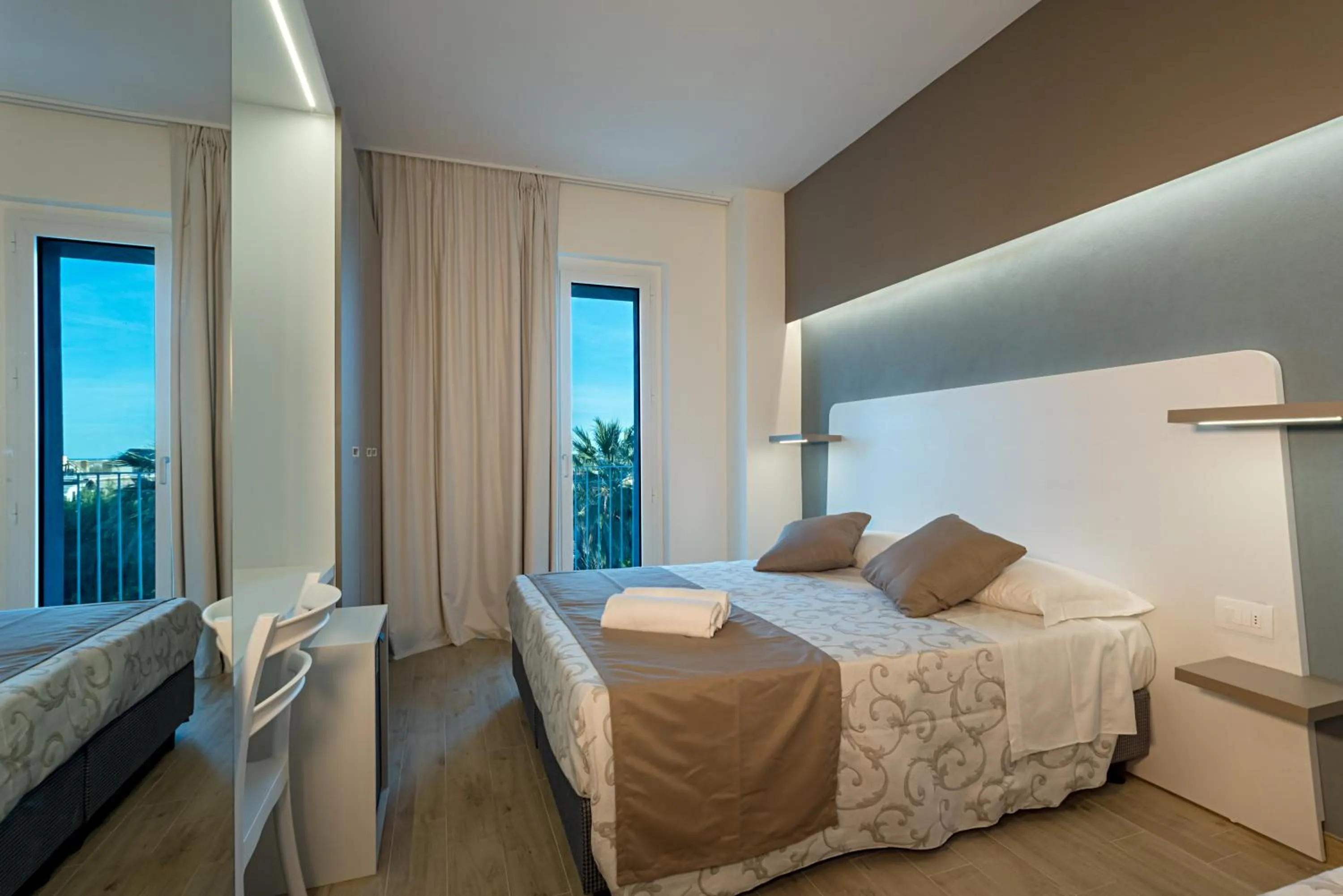 Bed in Family Hotel Relax