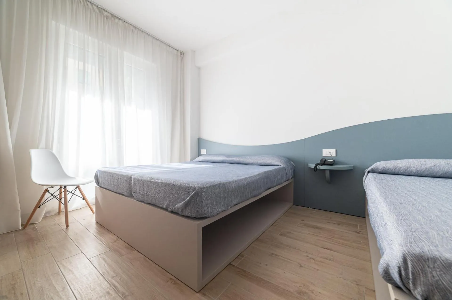 Bed in Family Hotel Relax