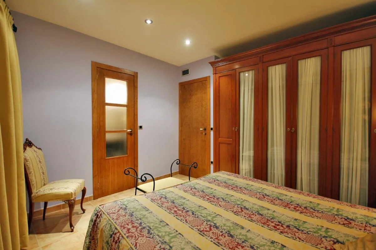 Bedroom, Bed in Apartamentos Santa Agueda
