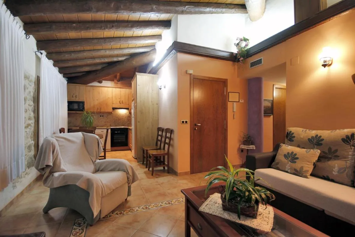 Kitchen or kitchenette, Bed in Apartamentos Santa Agueda