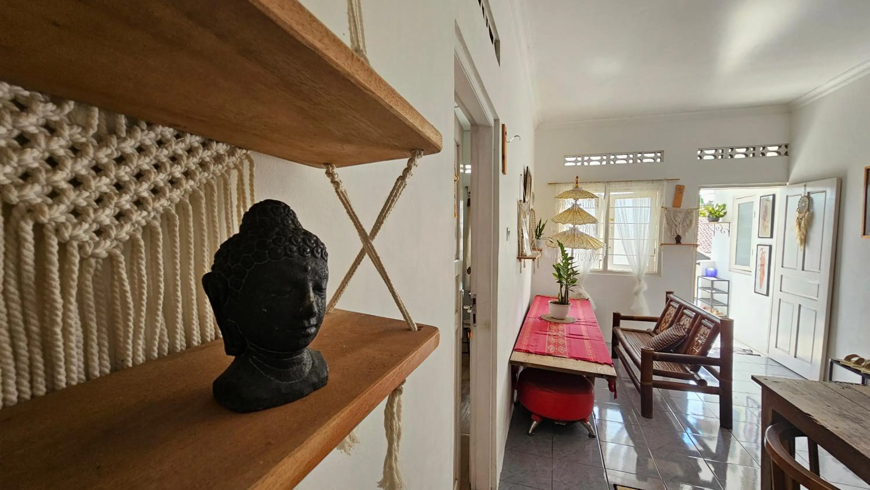 Living room, Bed in Oke Baik Hostel