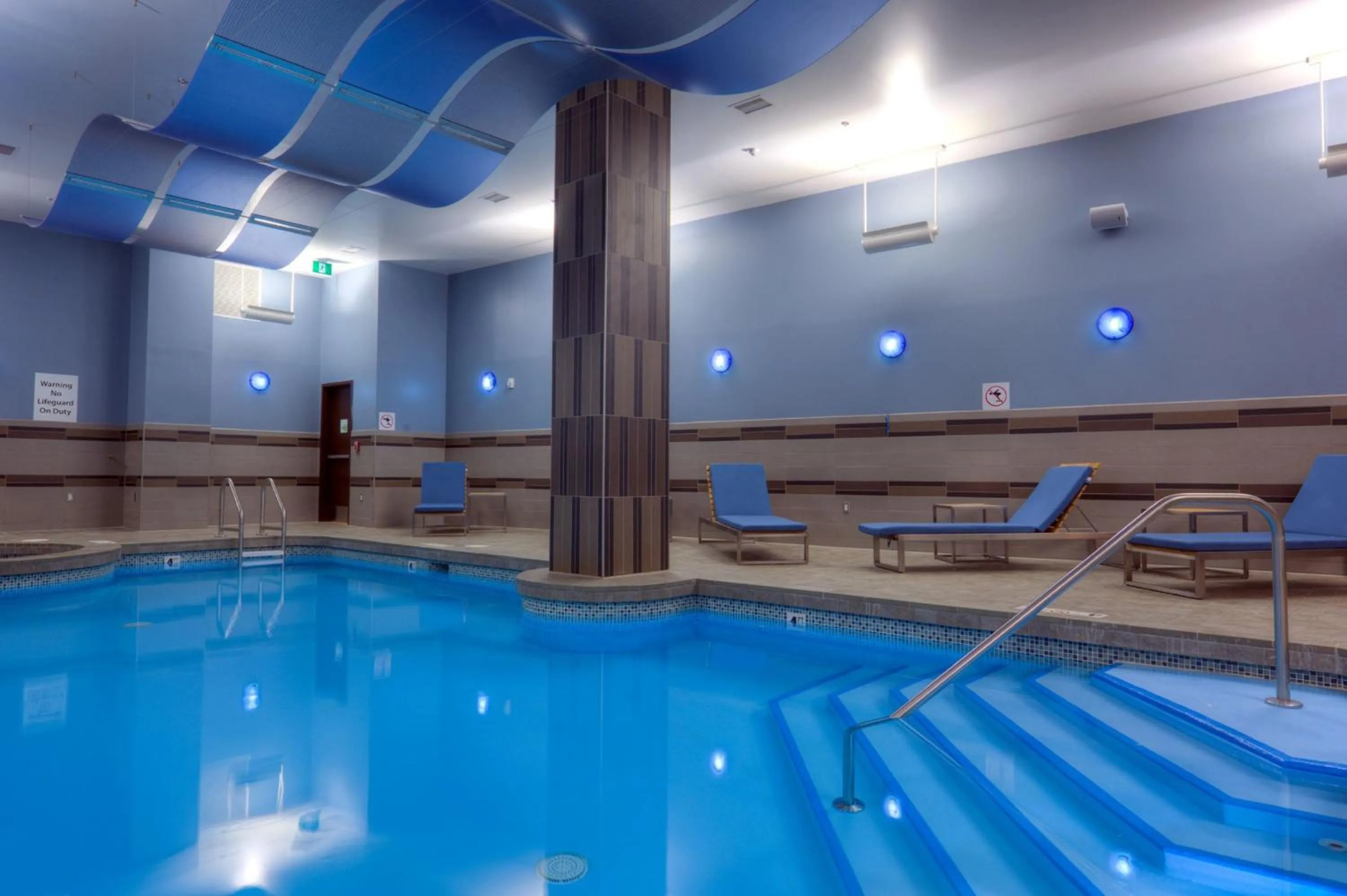 Swimming pool in Holiday Inn Saskatoon Downtown by IHG