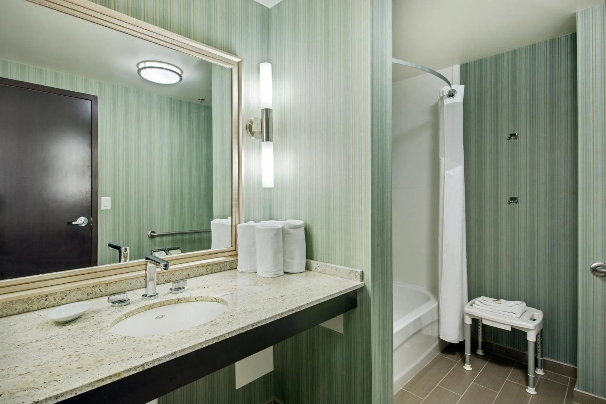 Bathroom in Holiday Inn Saskatoon Downtown by IHG