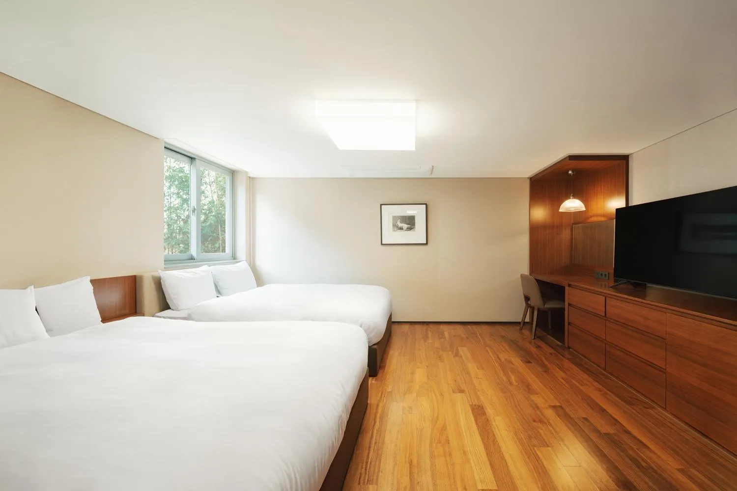 Bed in The Suites Hotel Namwon