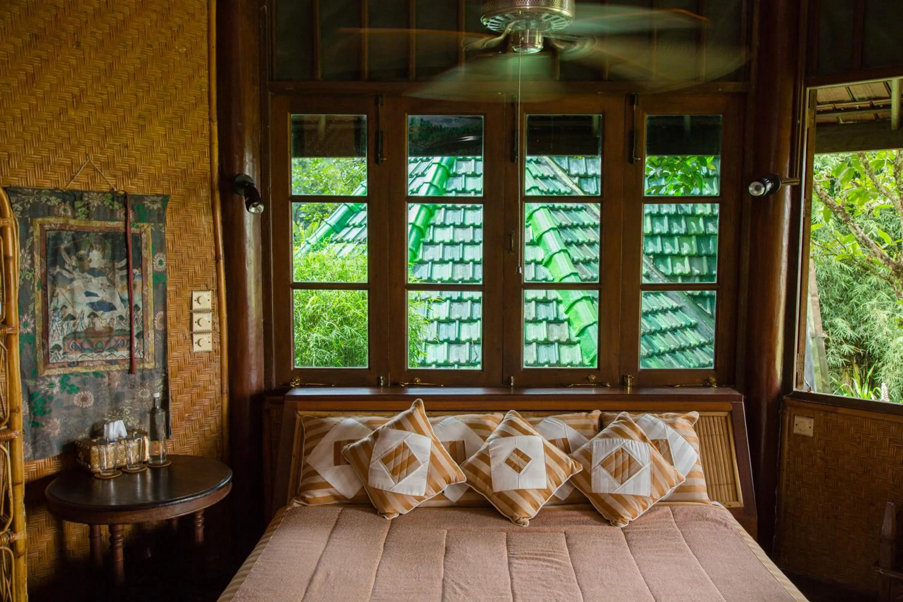 Bed in Tirtagangga Water Palace Villas
