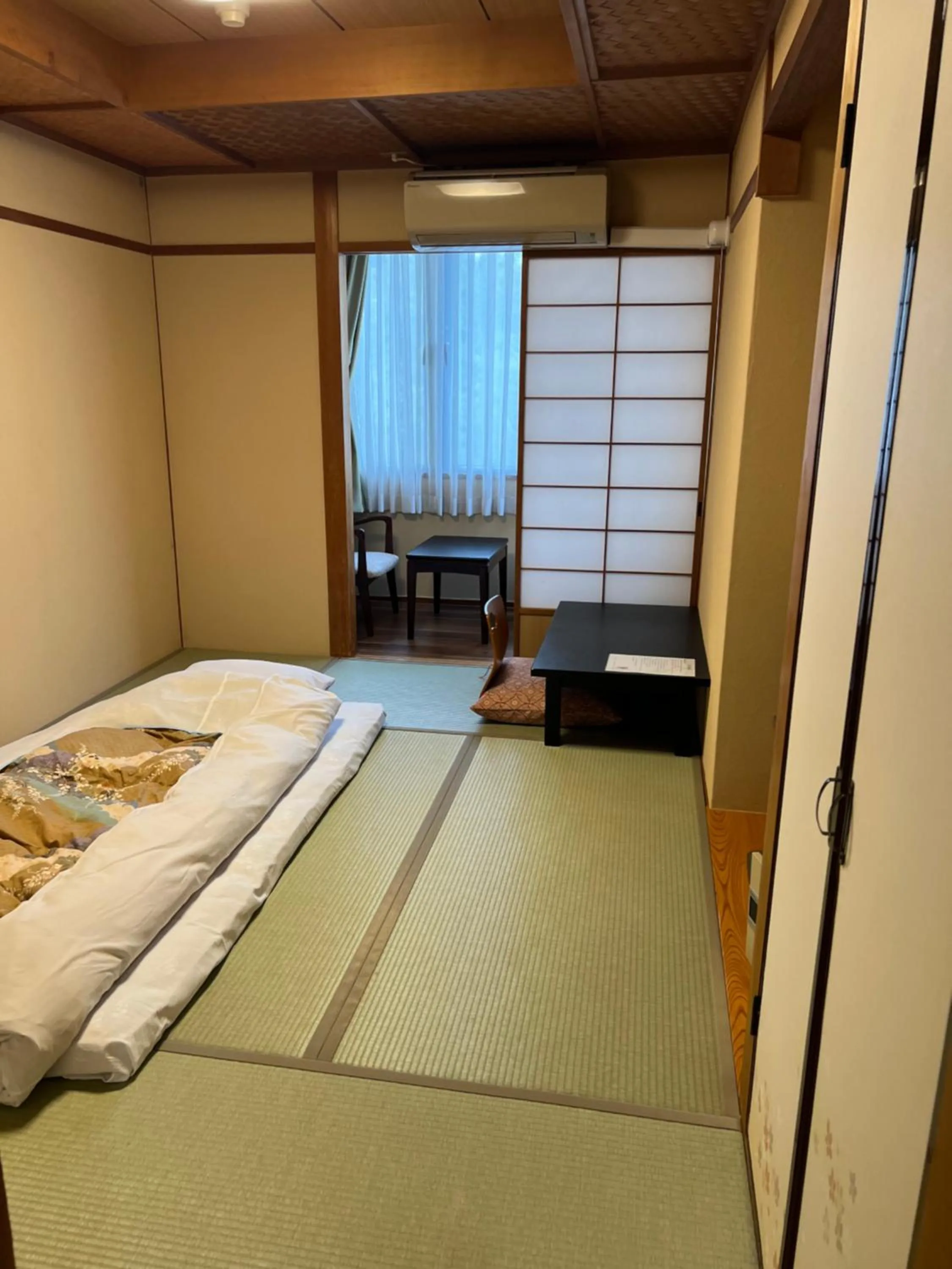 Bed in Ryokan Kousen