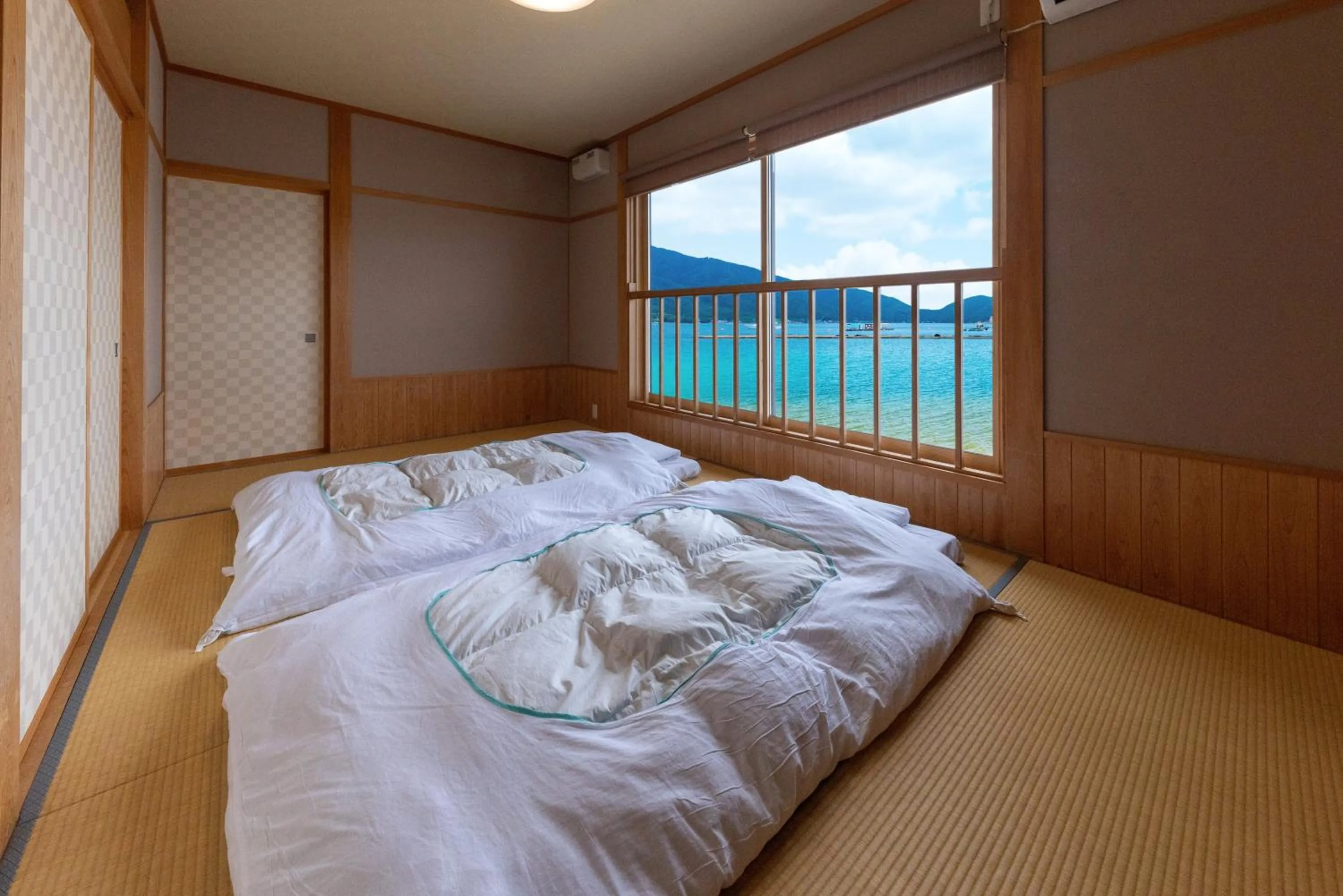 Photo of the whole room, Bed in Tsuruga Sazanami Resort Chobei