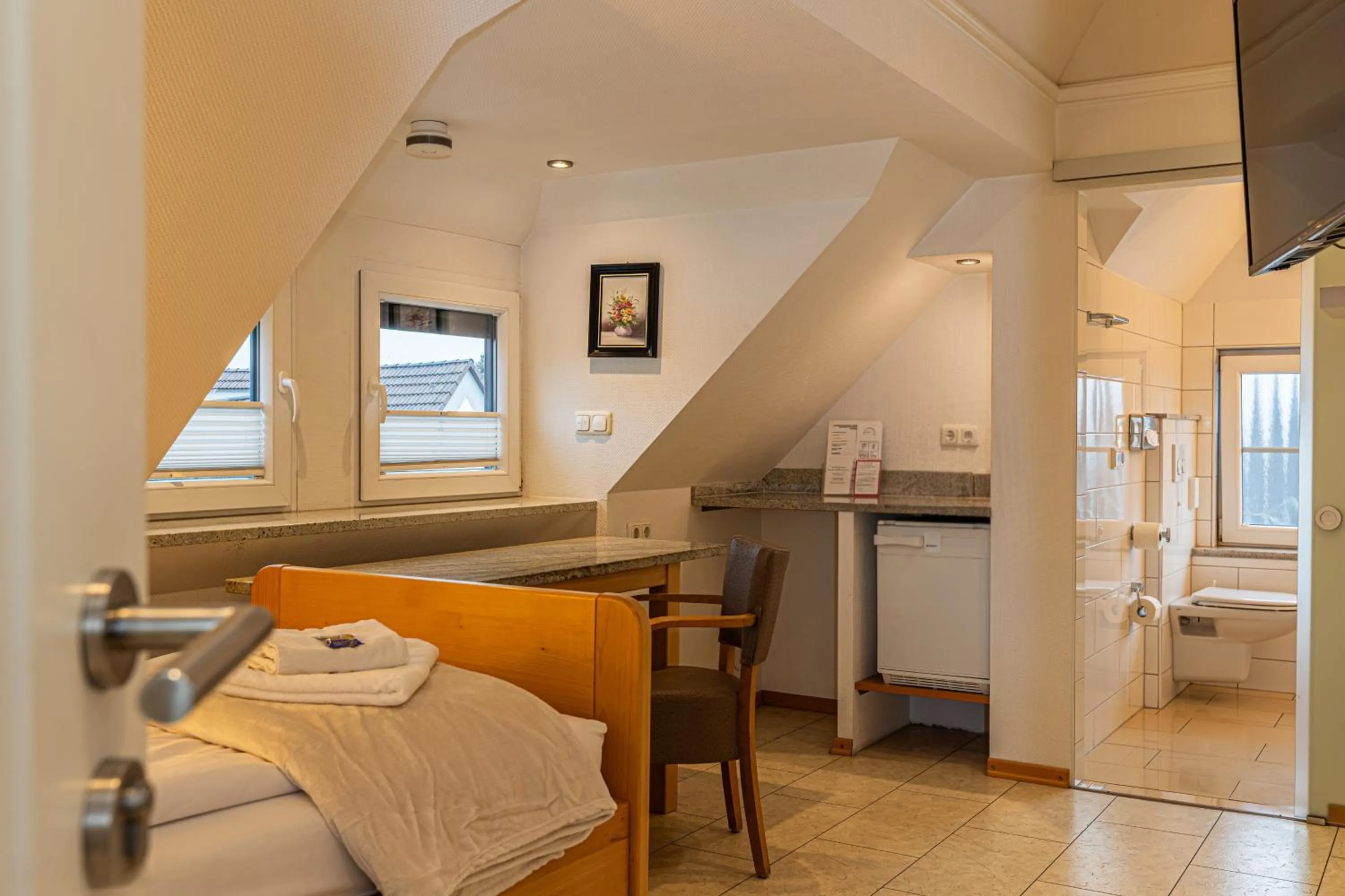 Bed in Gasper Business & Garden Hotel