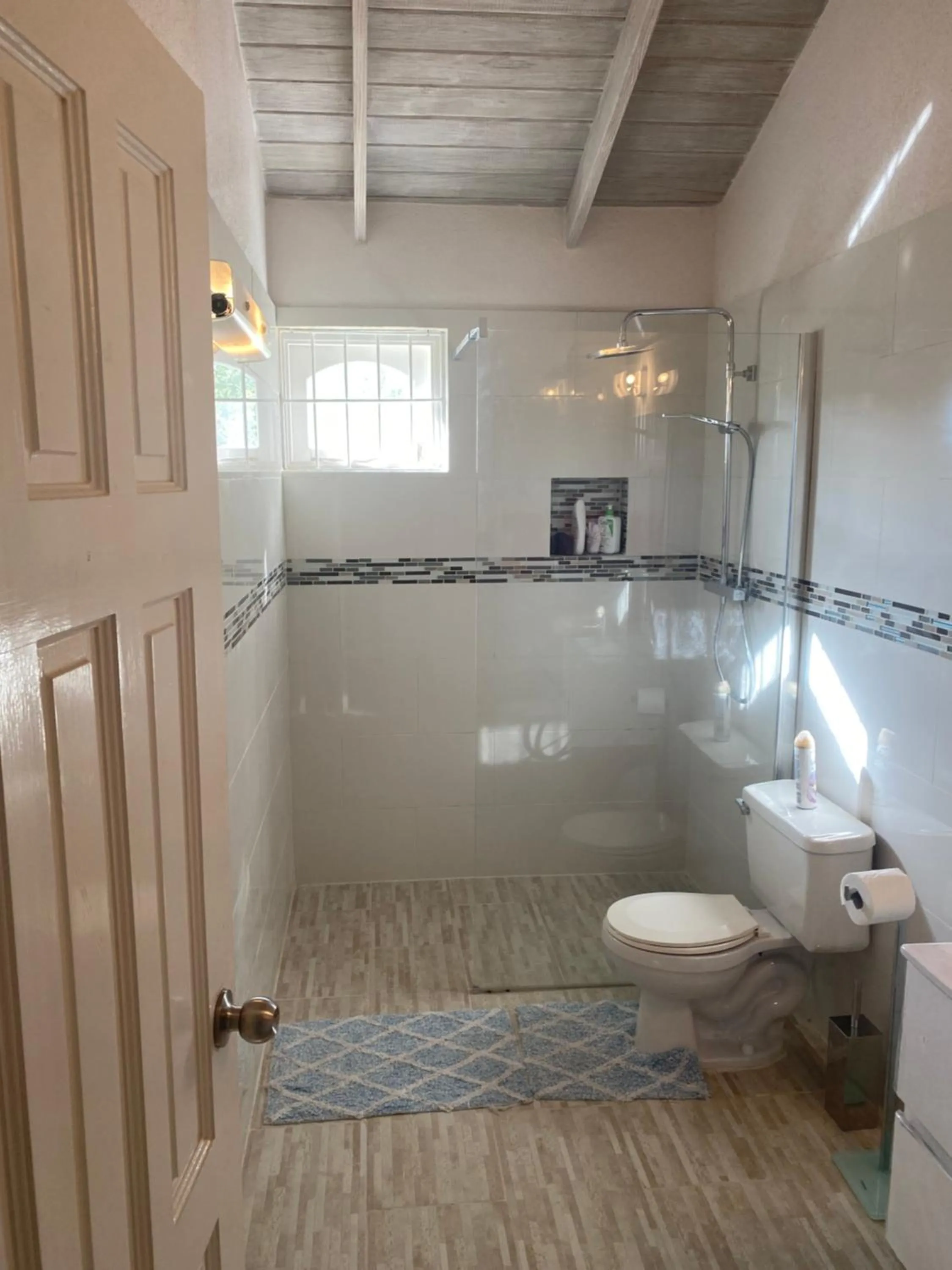 Shower in Spacious White House Villa 1 minute to sandy beaches