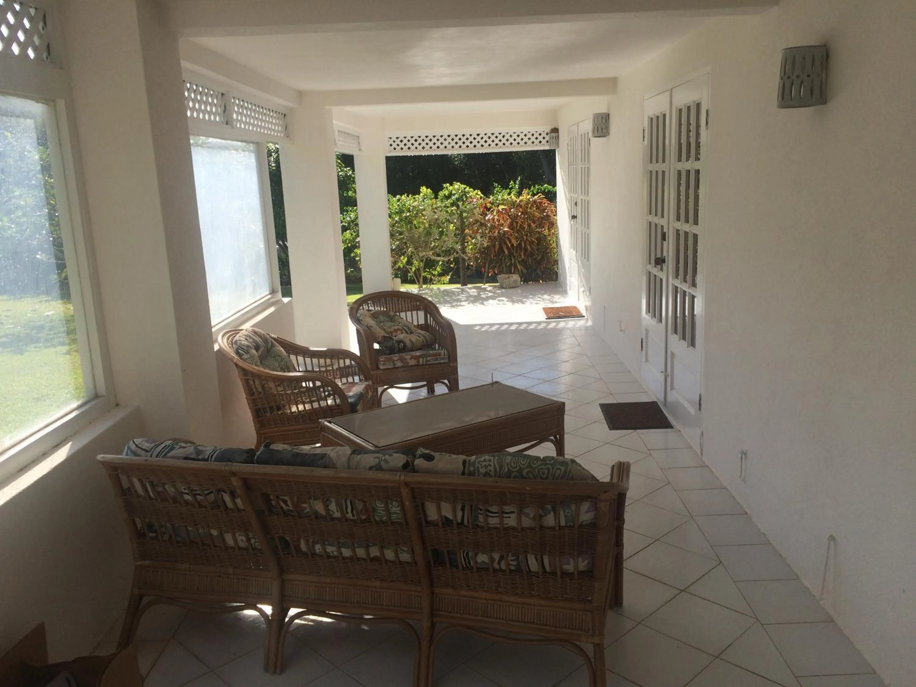 Patio in Spacious White House Villa 1 minute to sandy beaches