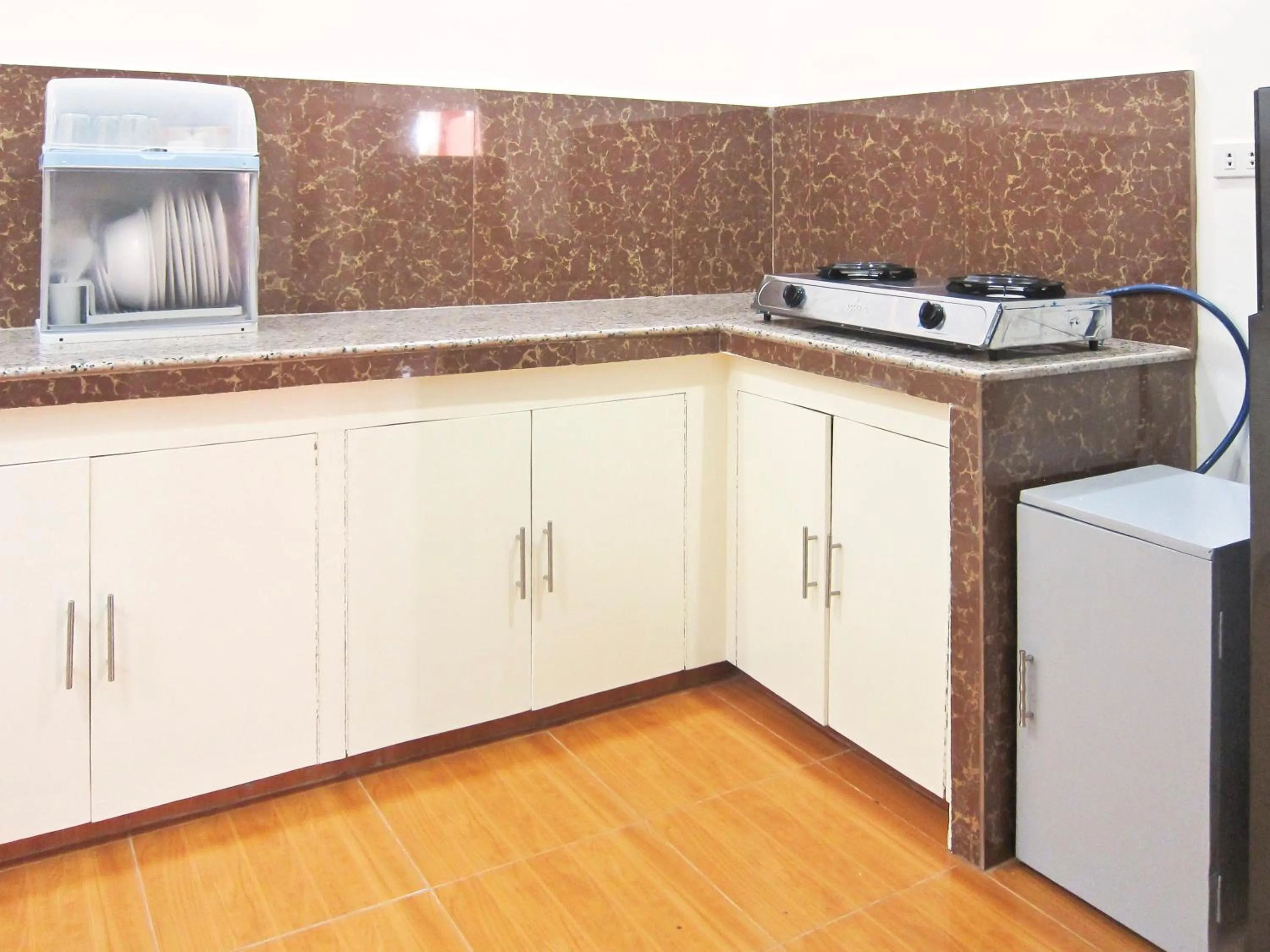 Kitchen or kitchenette in SMAK's Hotel