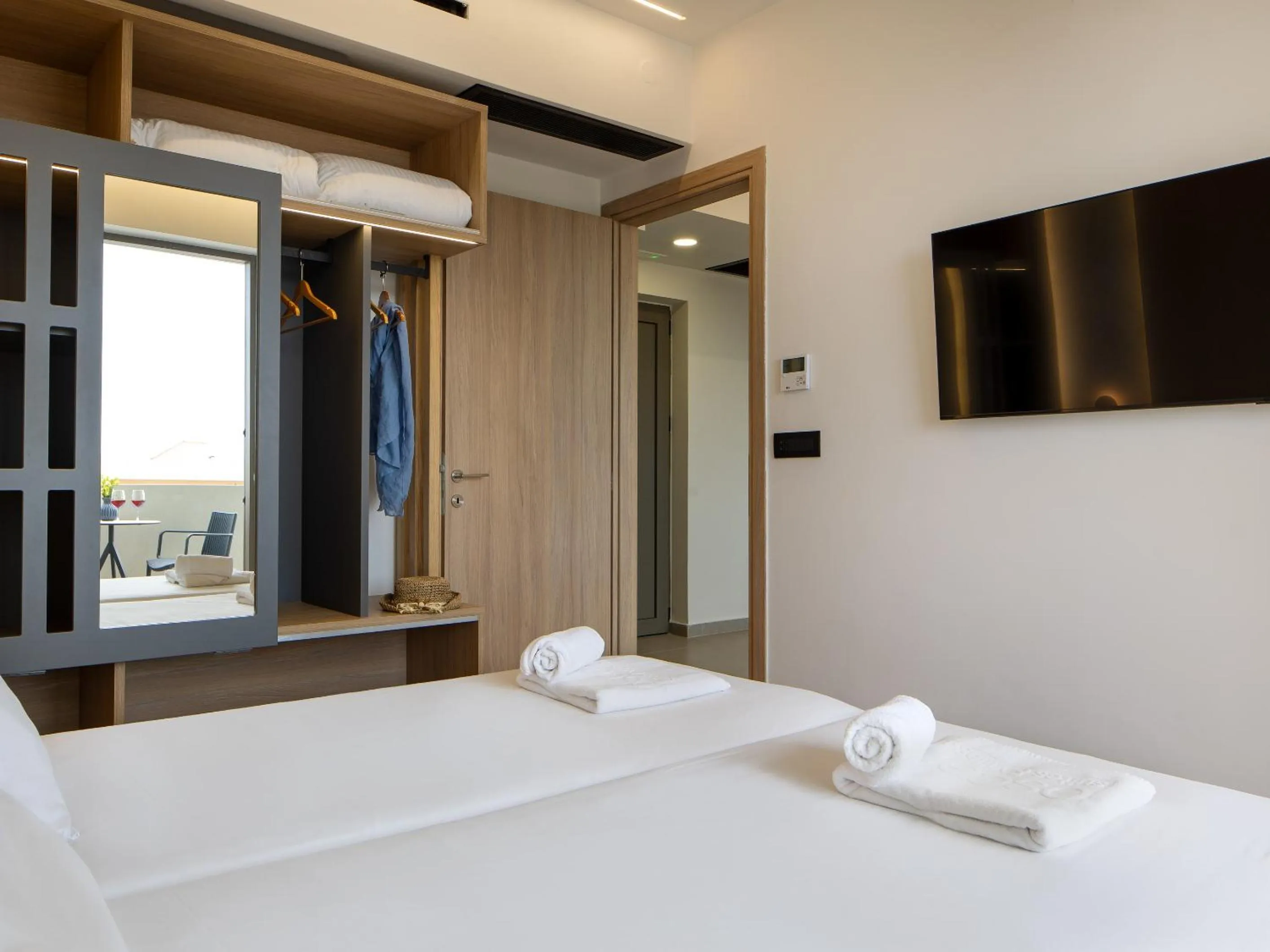 Bed in Oscar Suites & Village