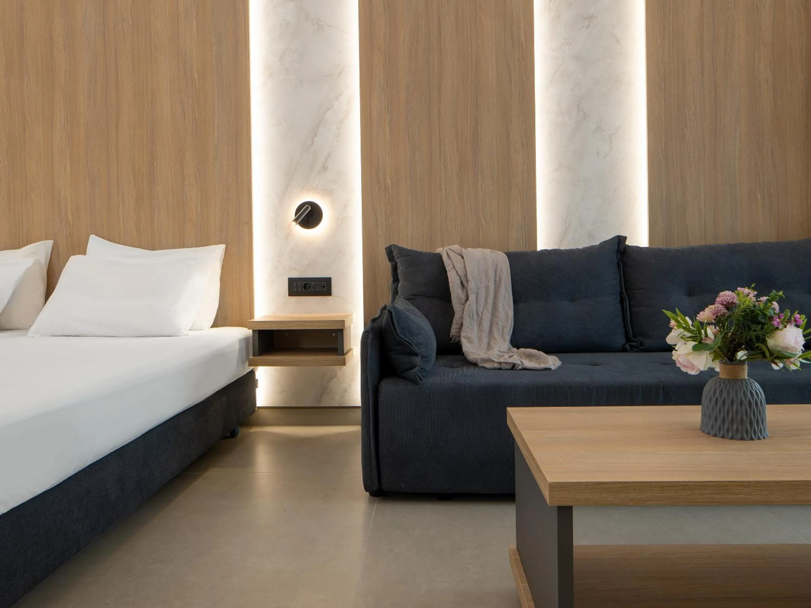 Bed in Oscar Suites & Village