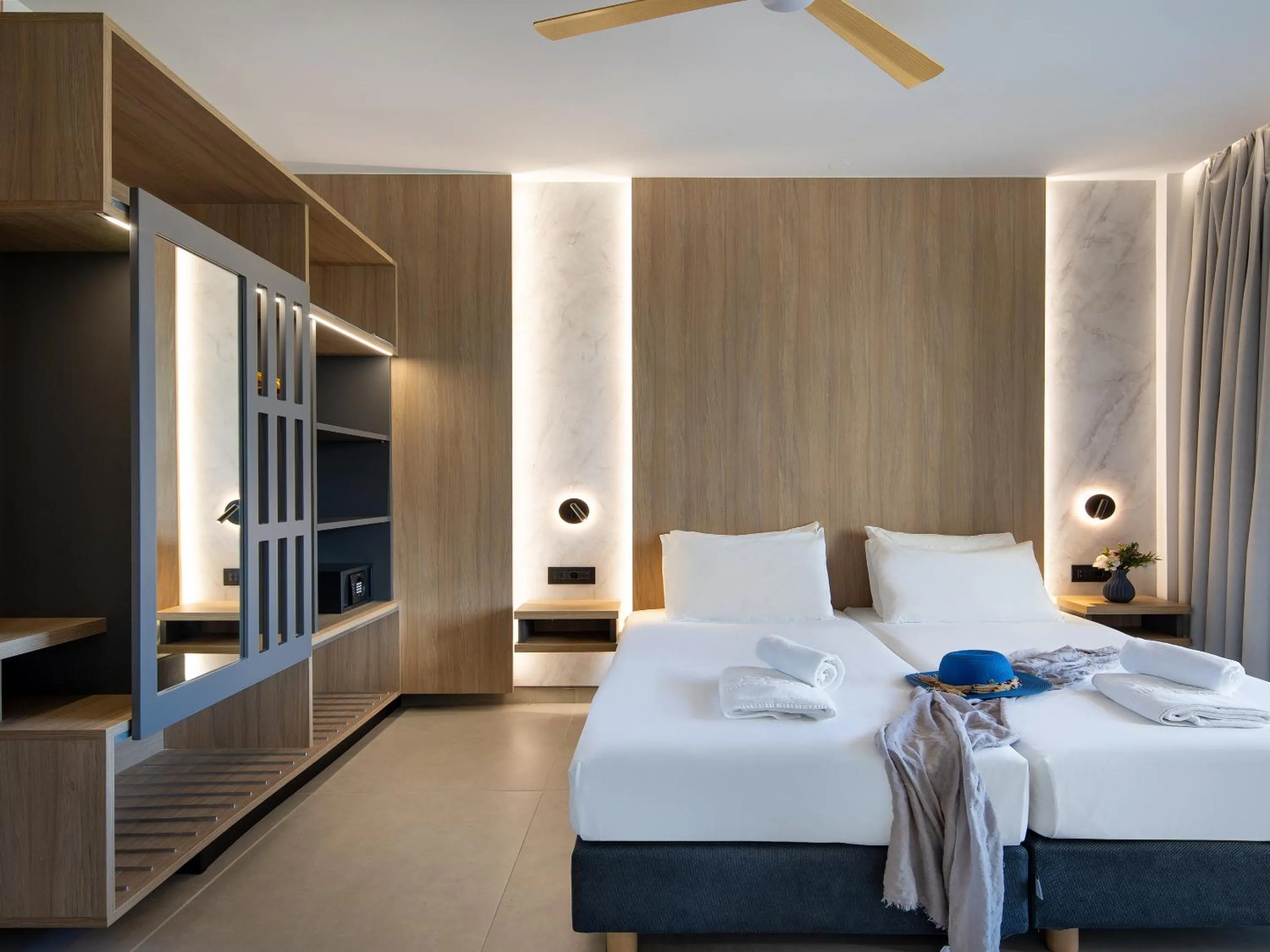 Bed in Oscar Suites & Village