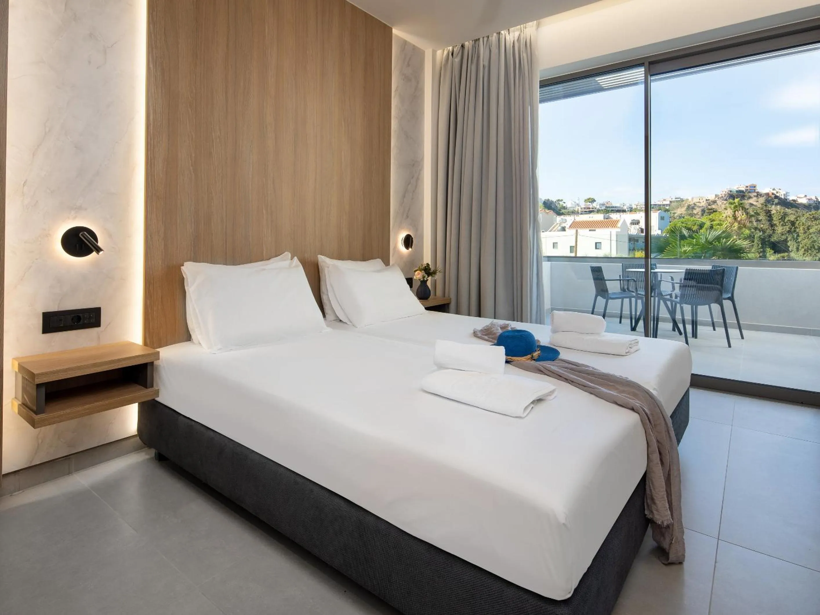 Bed in Oscar Suites & Village