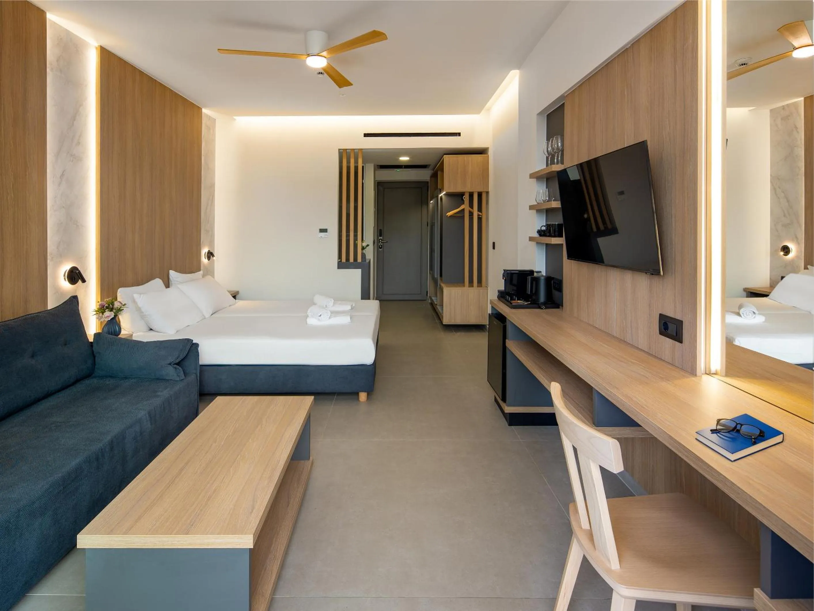 Bed in Oscar Suites & Village