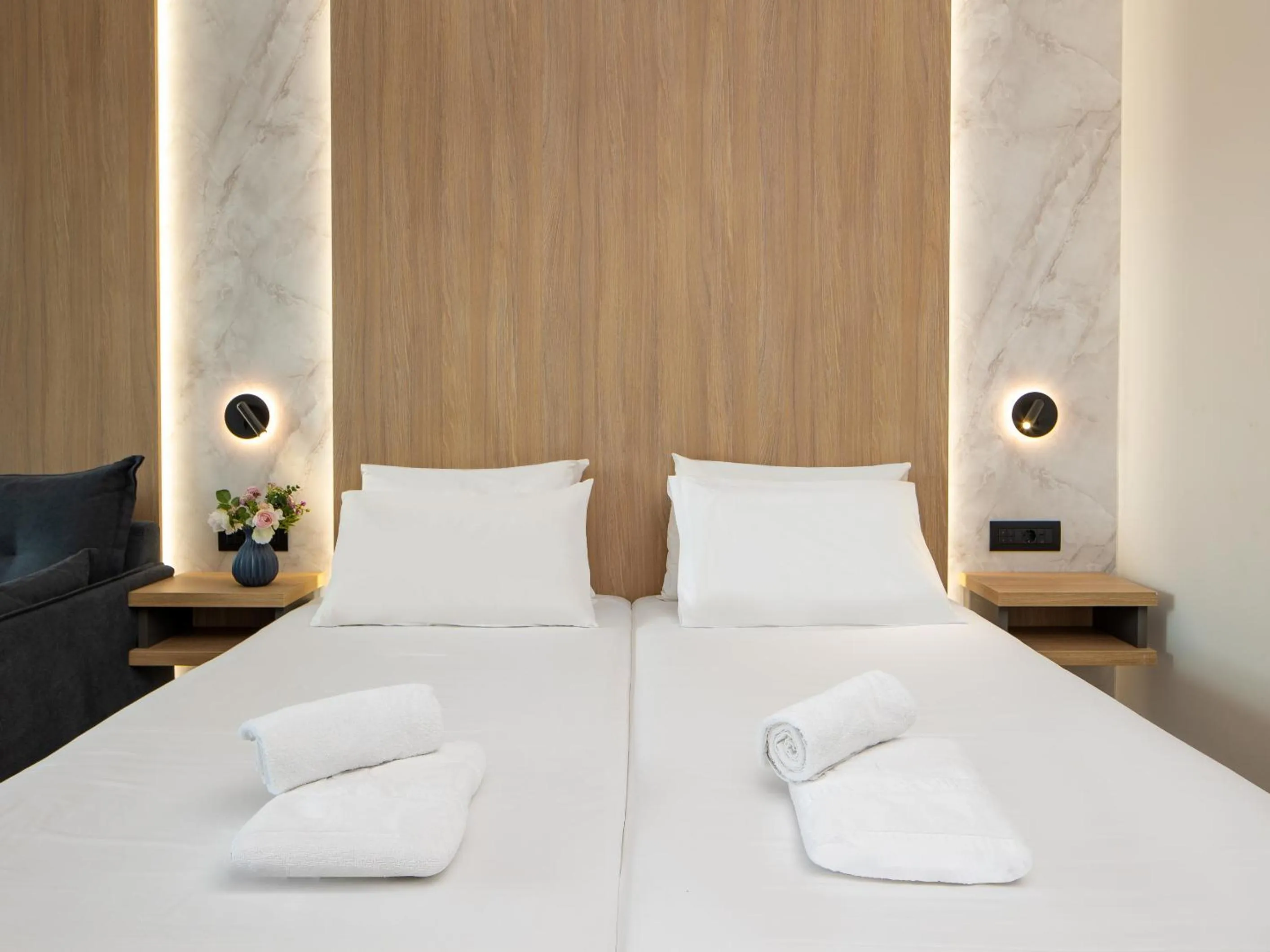 Bed in Oscar Suites & Village