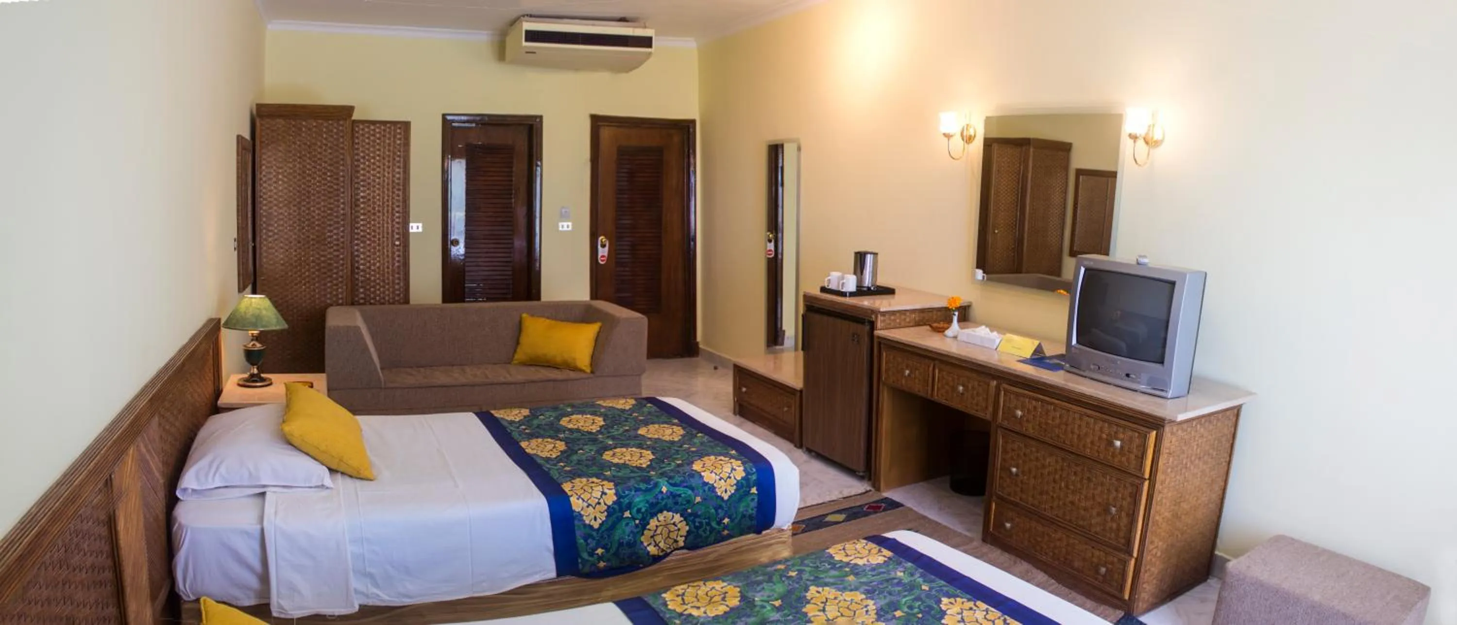 Bed in Lotus Bay Resort