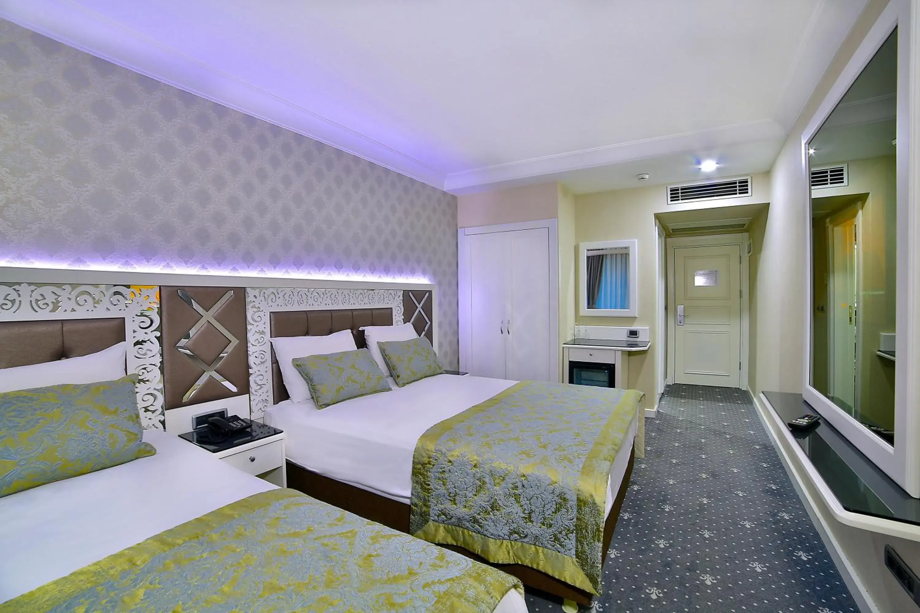 Triple Room in Monaco Hotel Triple Room in Monaco Hotel