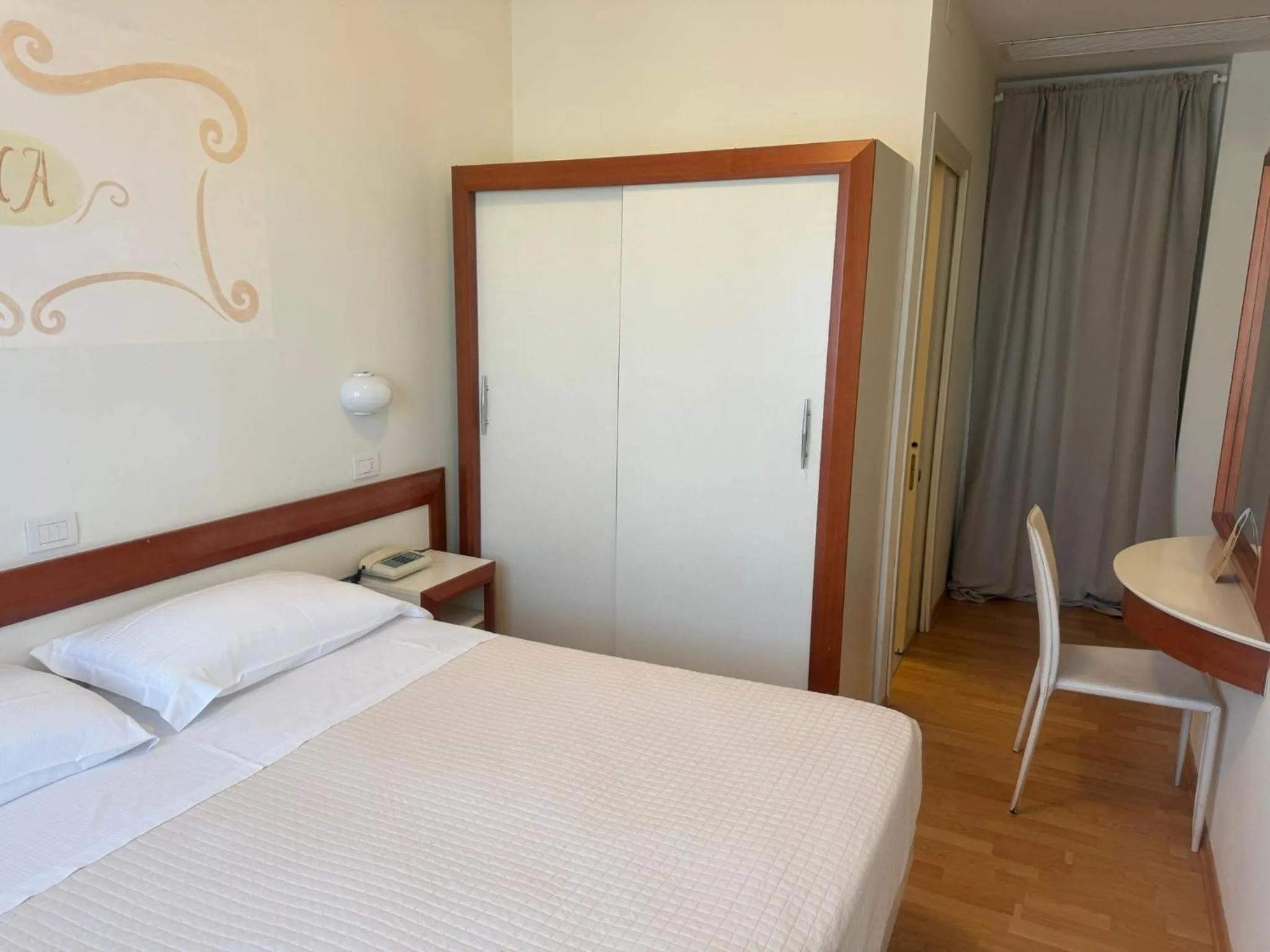 Bed in Hotel Aristeo