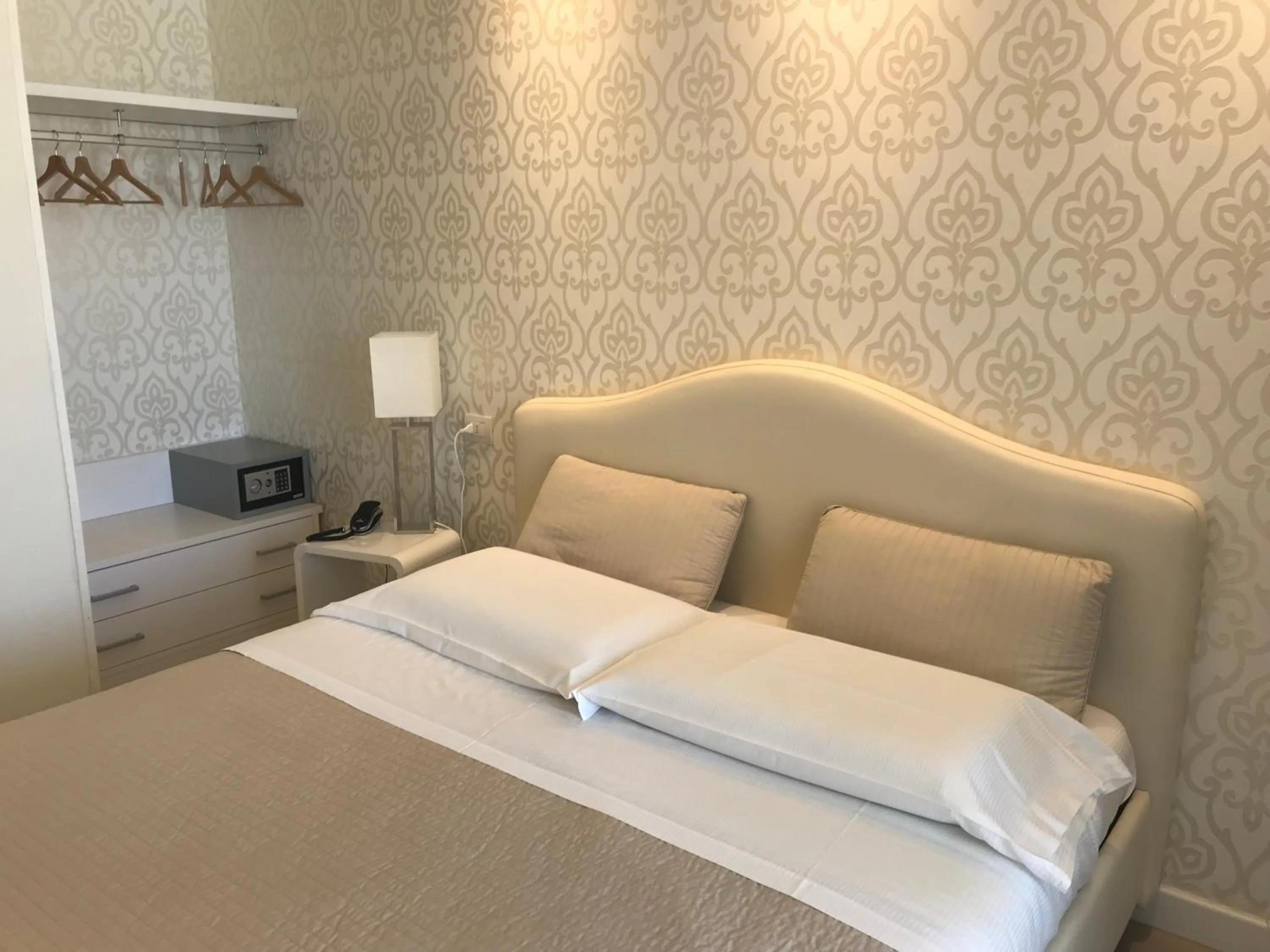 Bed in Hotel Aristeo