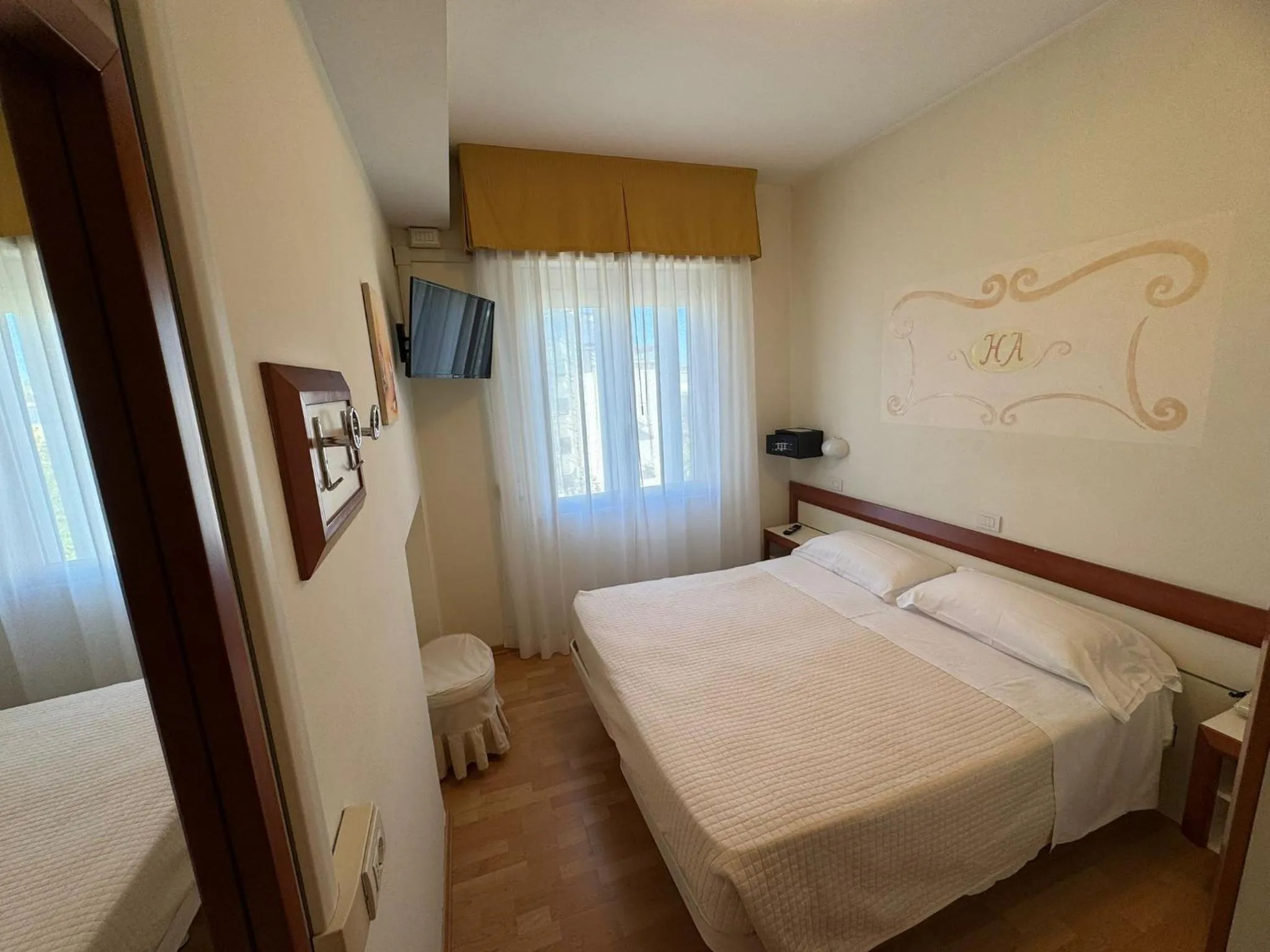 Bed in Hotel Aristeo