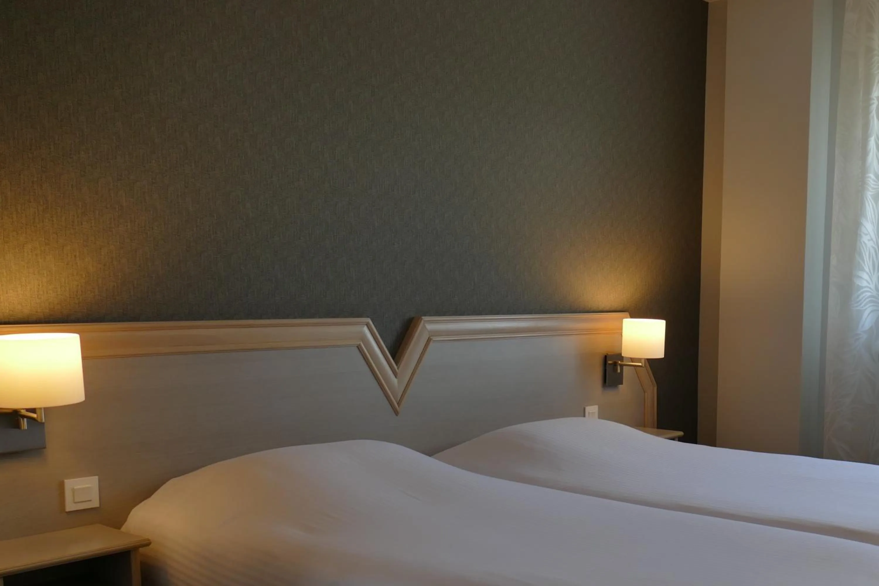 Bed in Au Relais de l'Ill