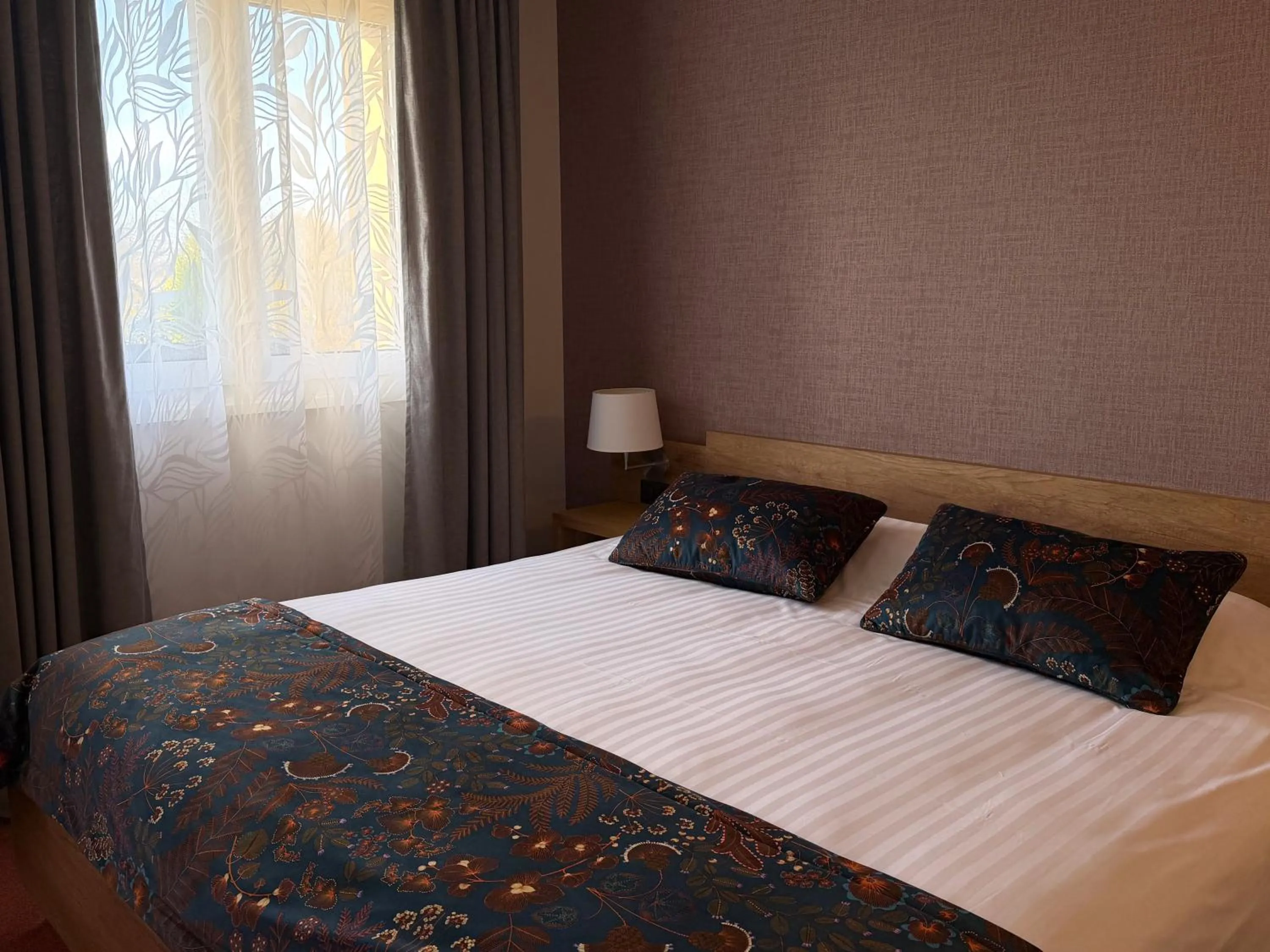 Bed in Au Relais de l'Ill