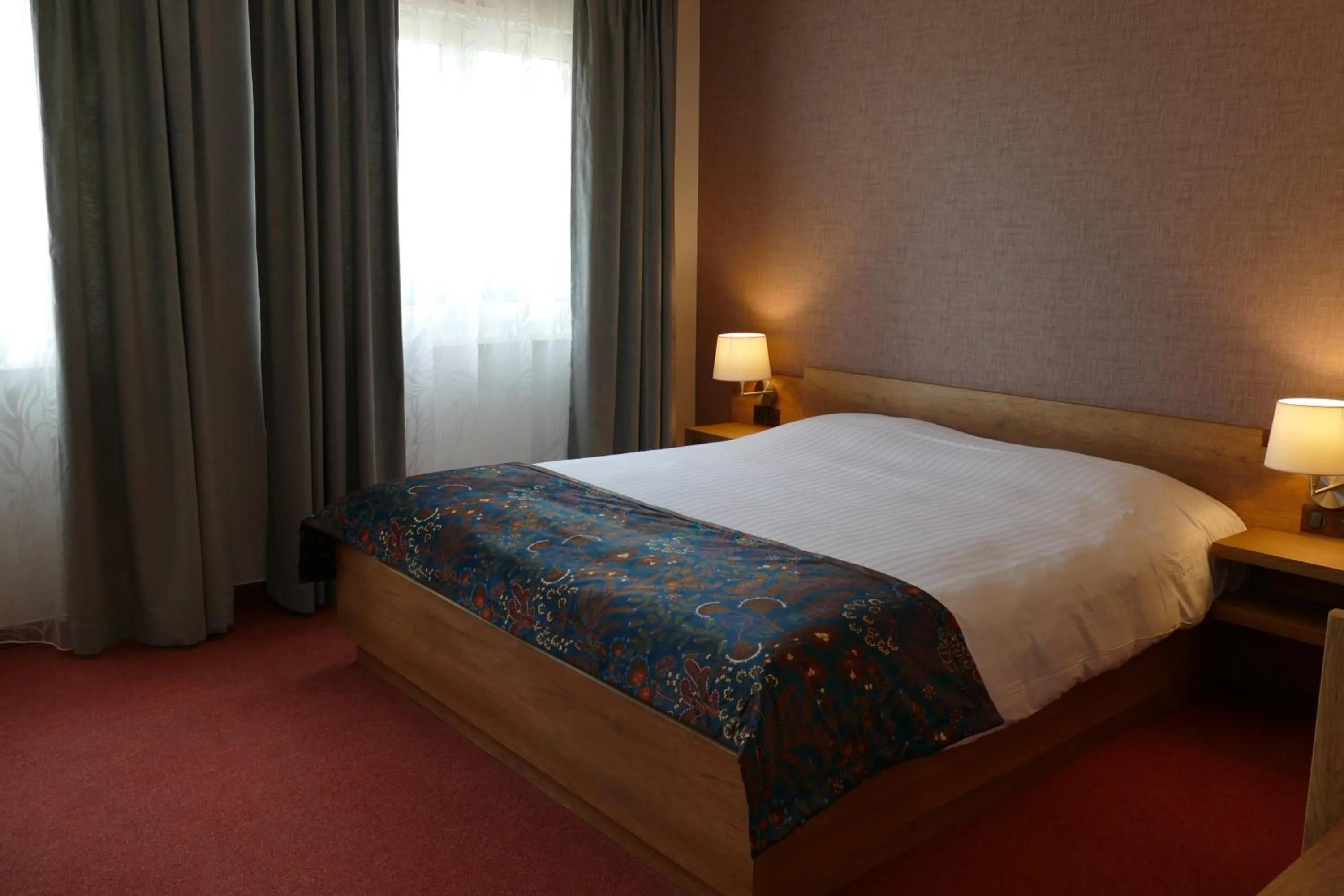 Bed in Au Relais de l'Ill