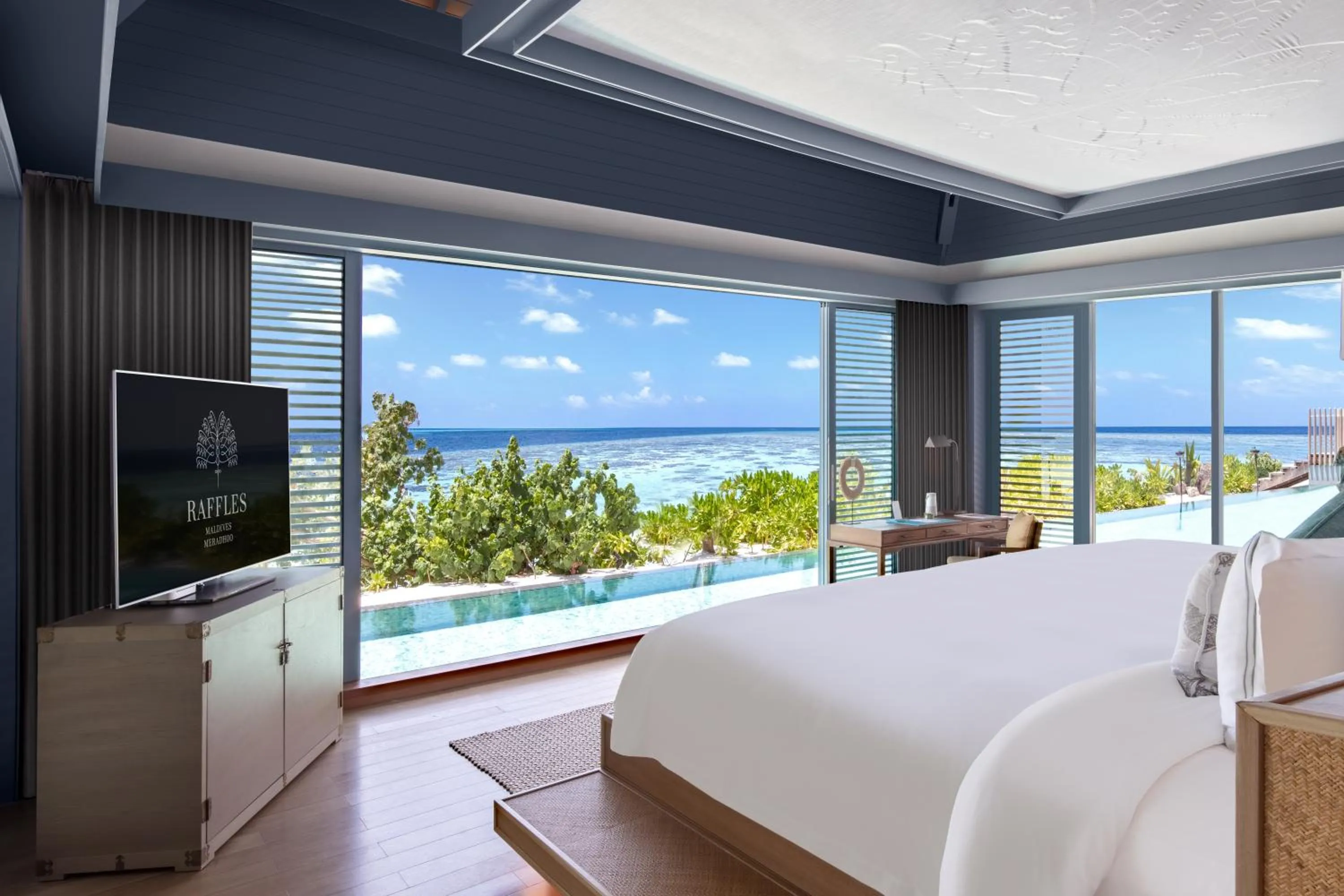 Bed in Raffles Maldives Meradhoo