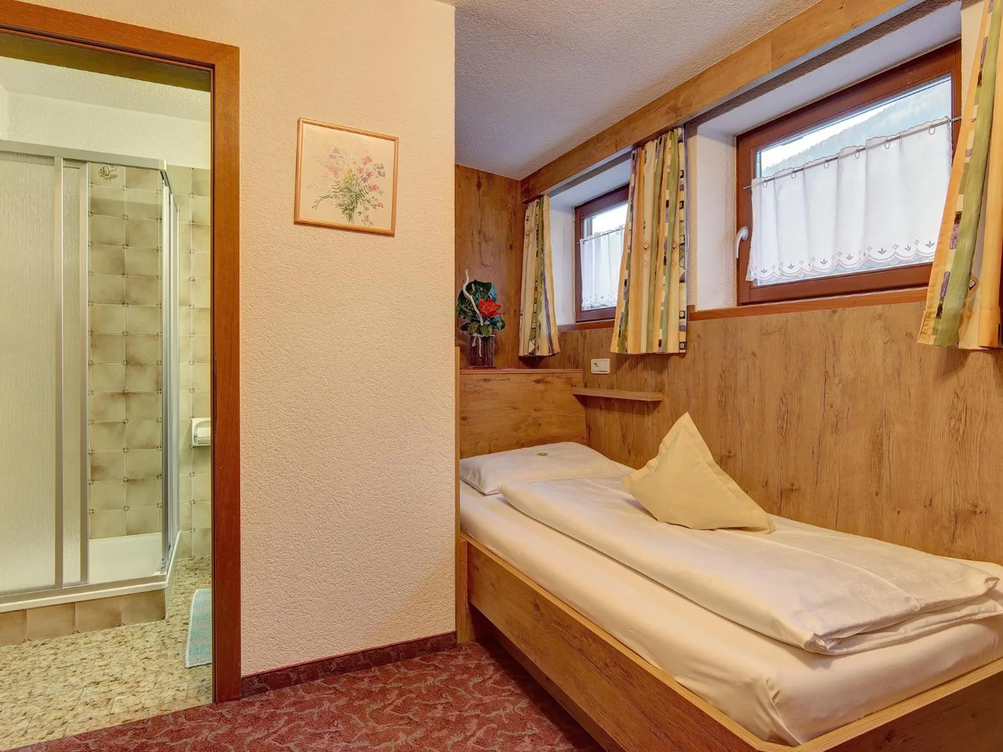 Photo of the whole room, Bed in Hotel Gisserhof - Dolomea Hotel