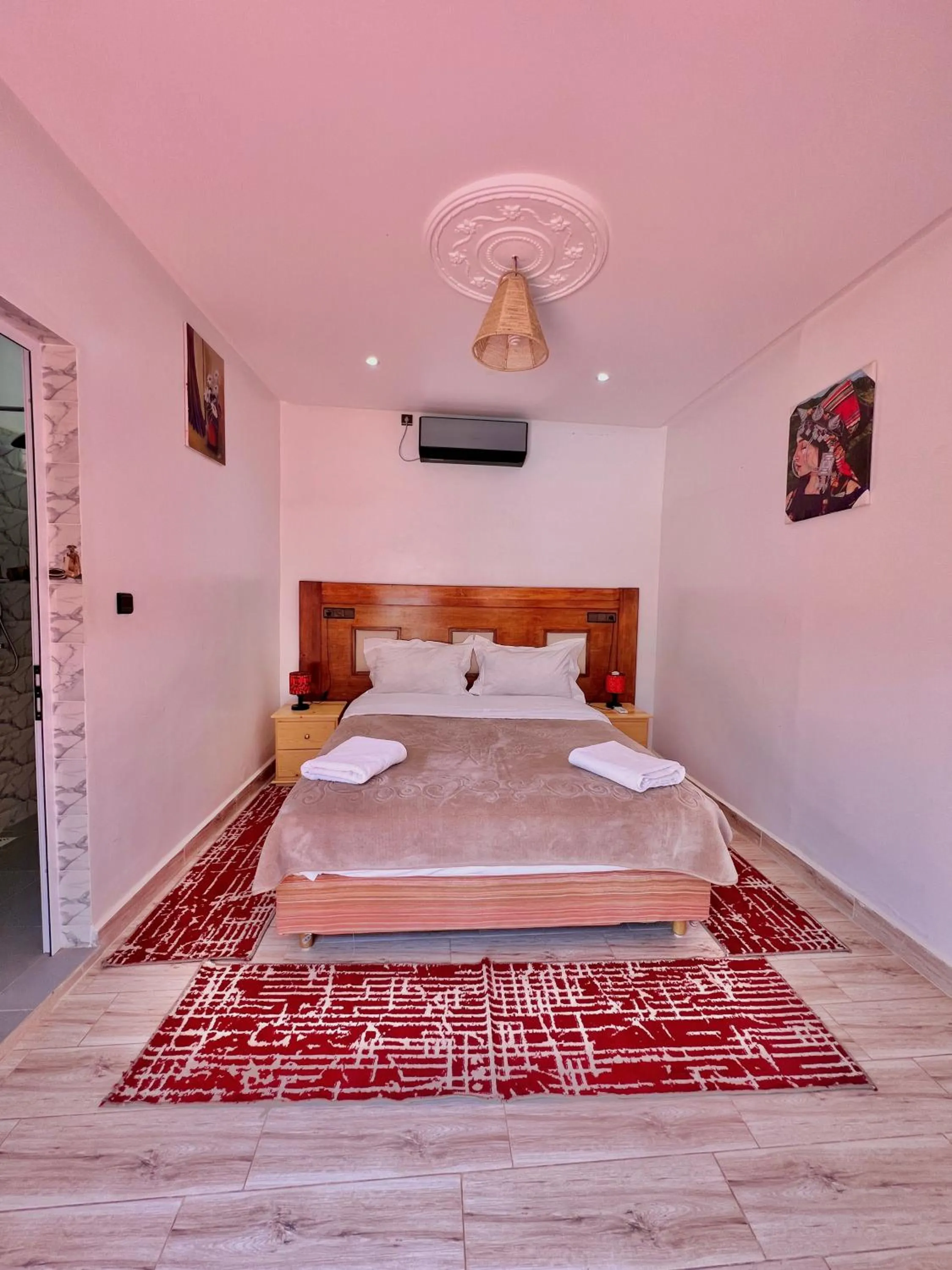 Bed in Hotel L'Arganier d'Ammelne