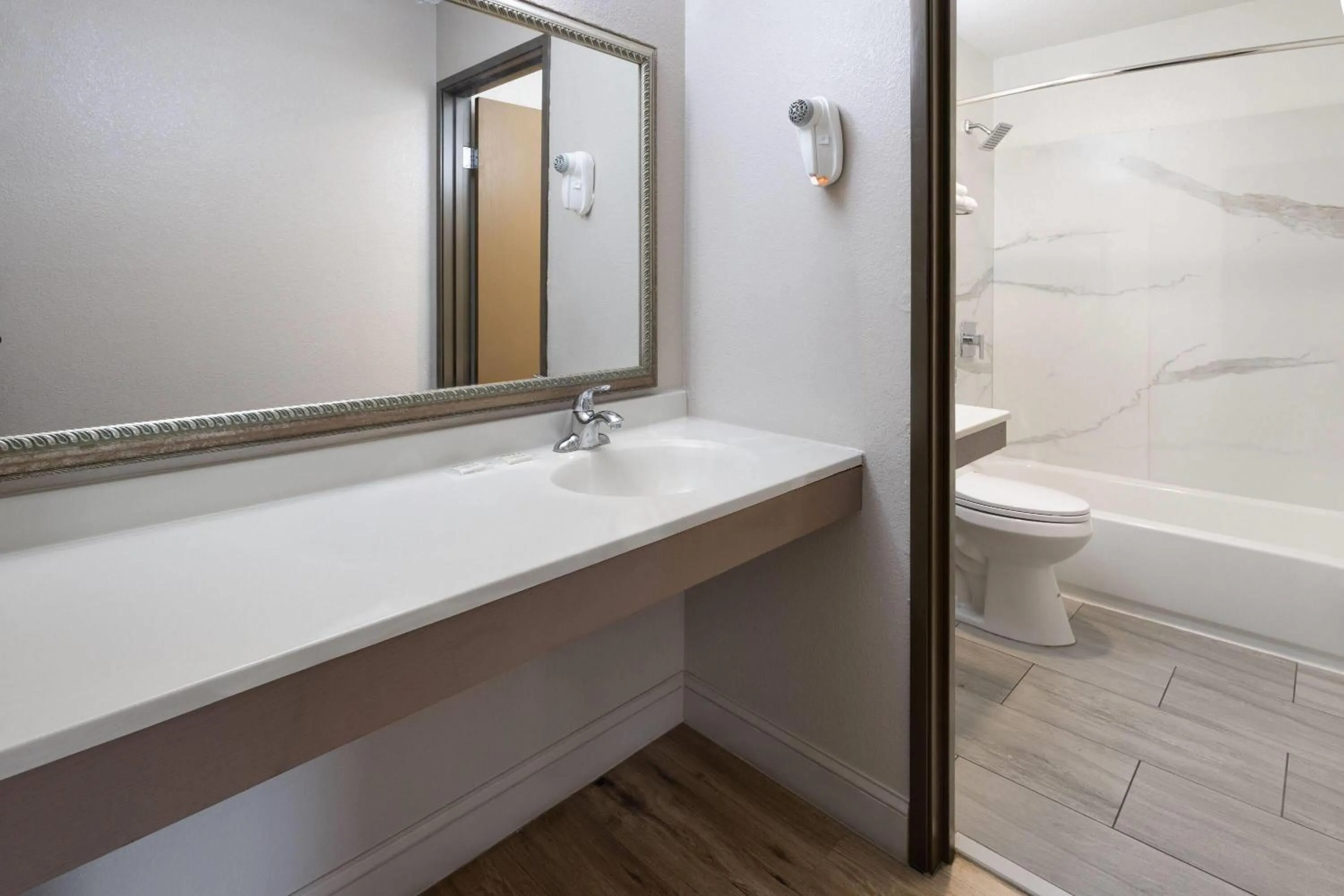 Bathroom in Super 8 by Wyndham Richmond Midlothian Turnpike