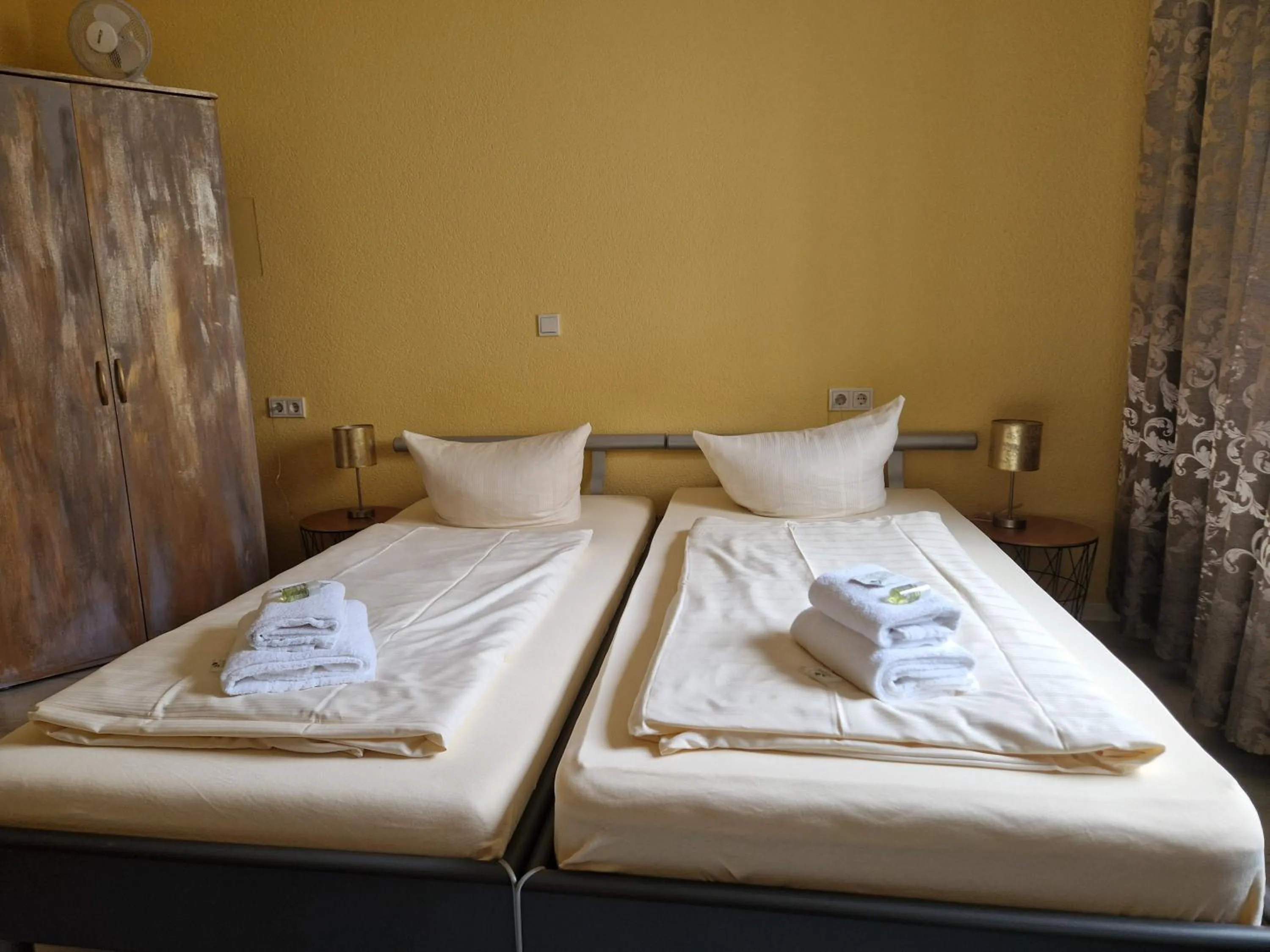 Bed in Ricks City Hotel