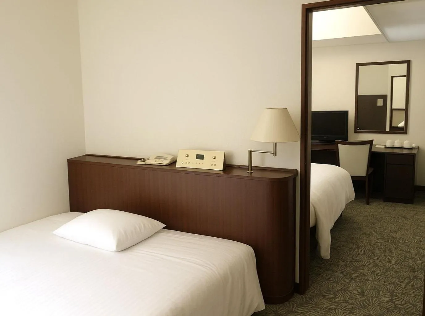 Bed in Art Hotel Narita