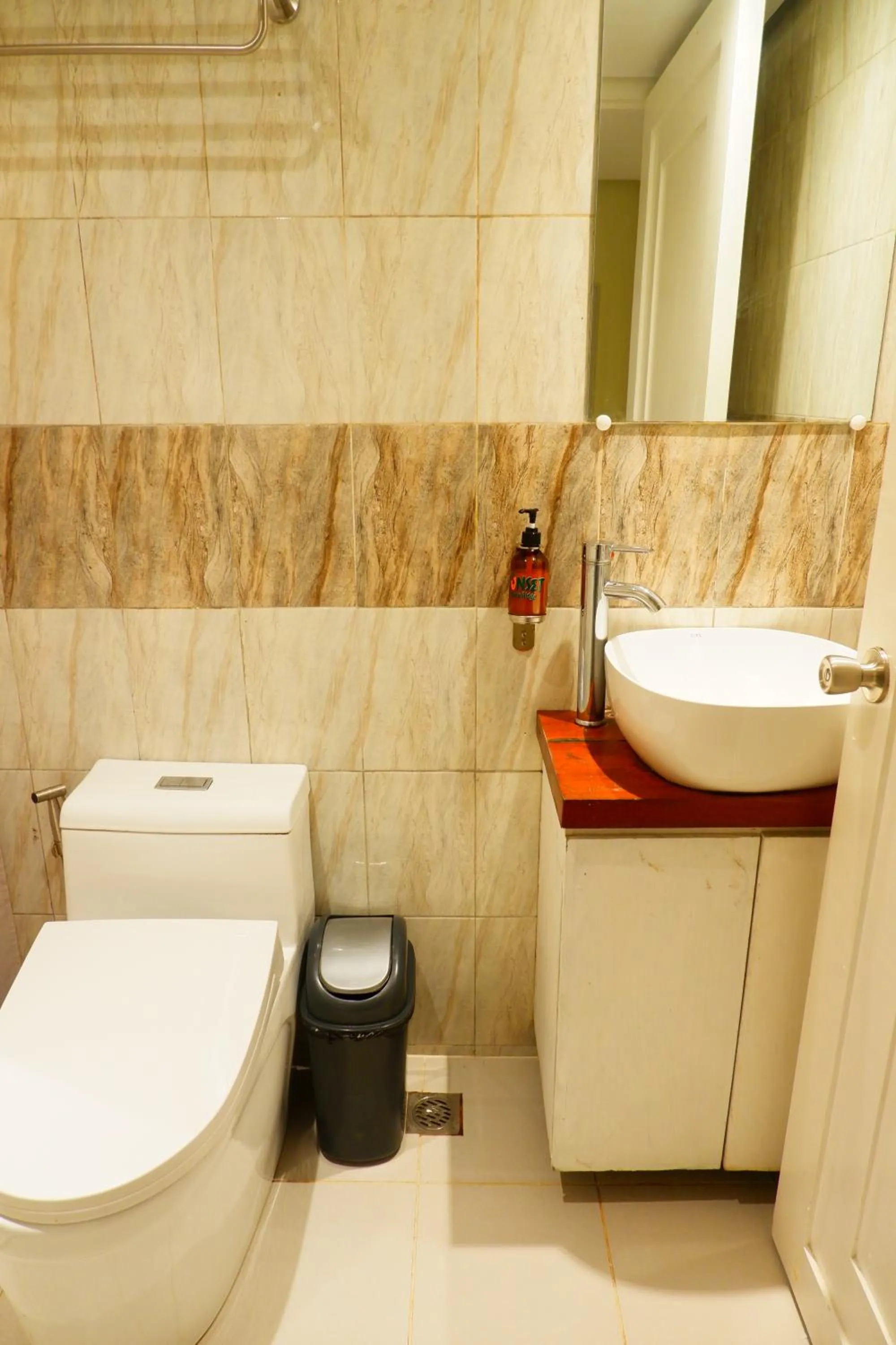 Toilet in Sunset View Ridge Residences