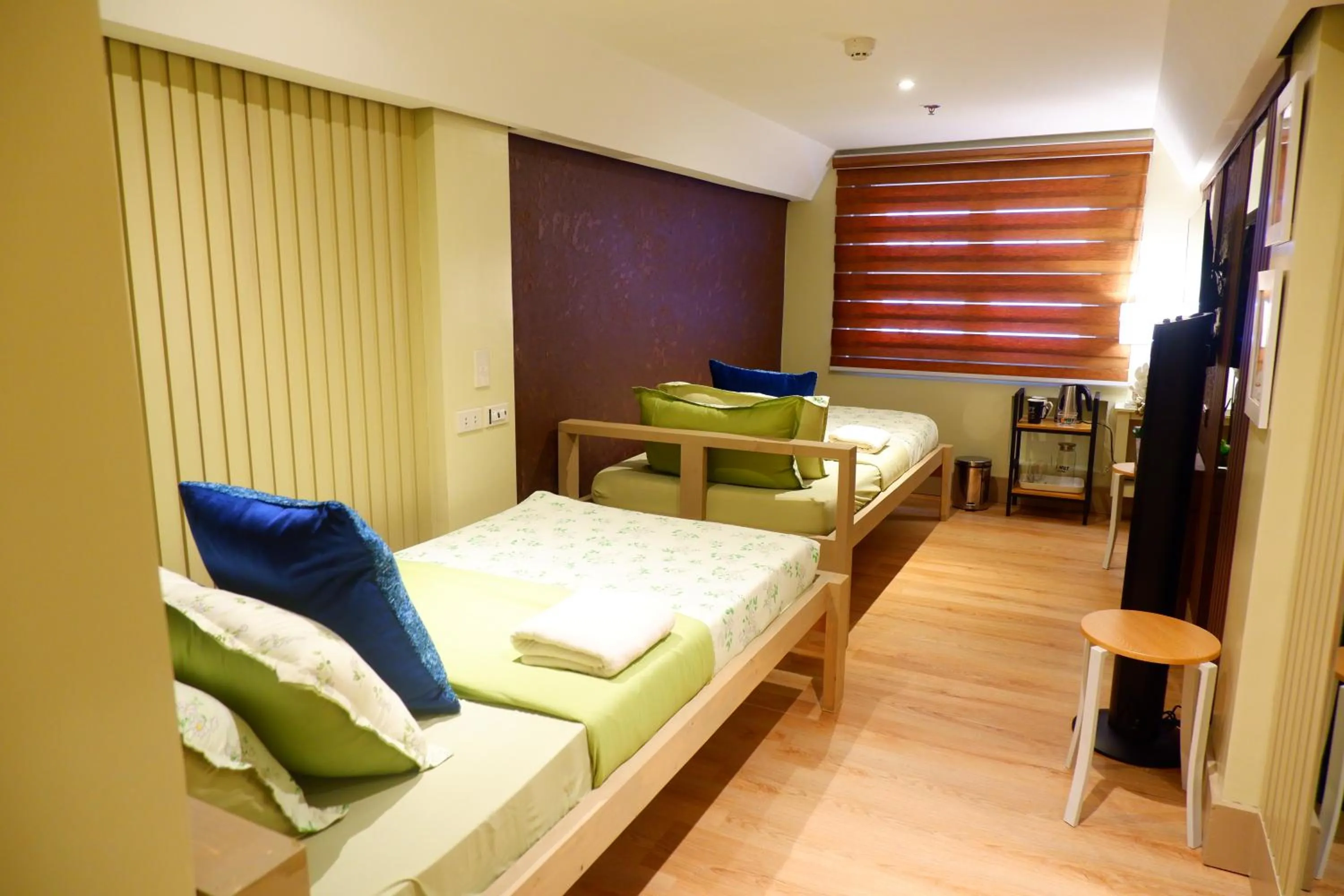 Bed in Sunset View Ridge Residences