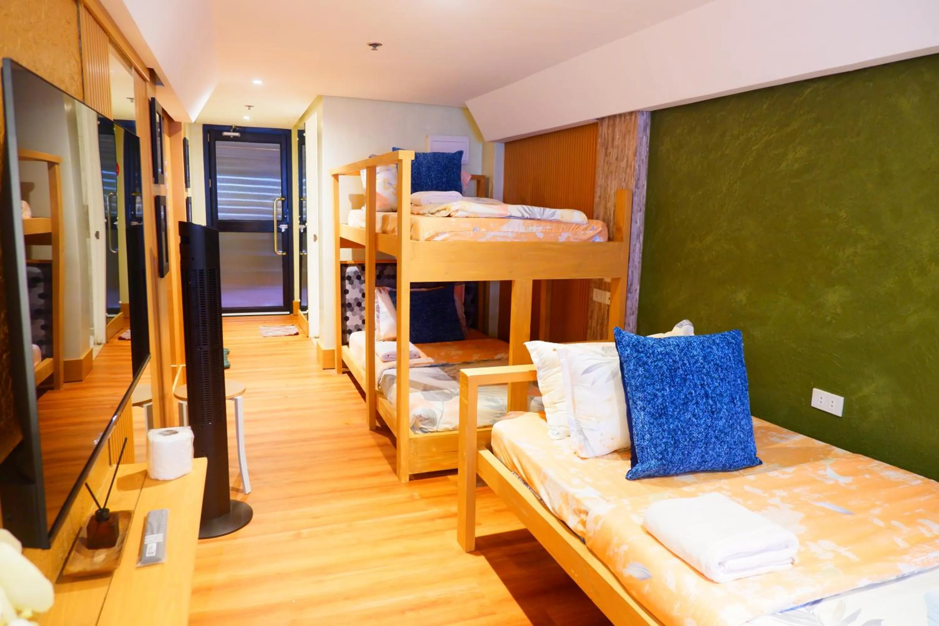 Bed in Sunset View Ridge Residences