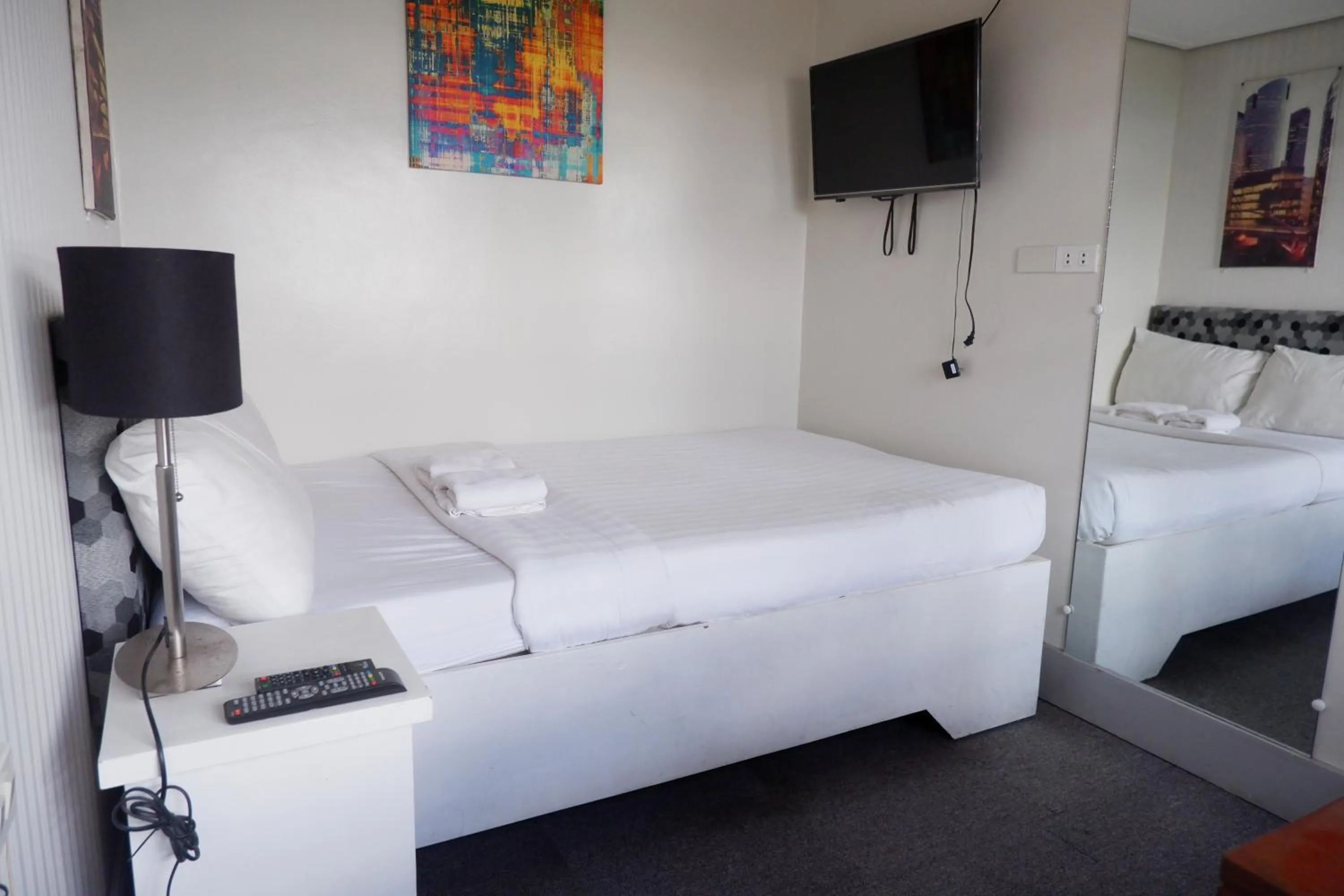 Bed in Sunset View Ridge Residences