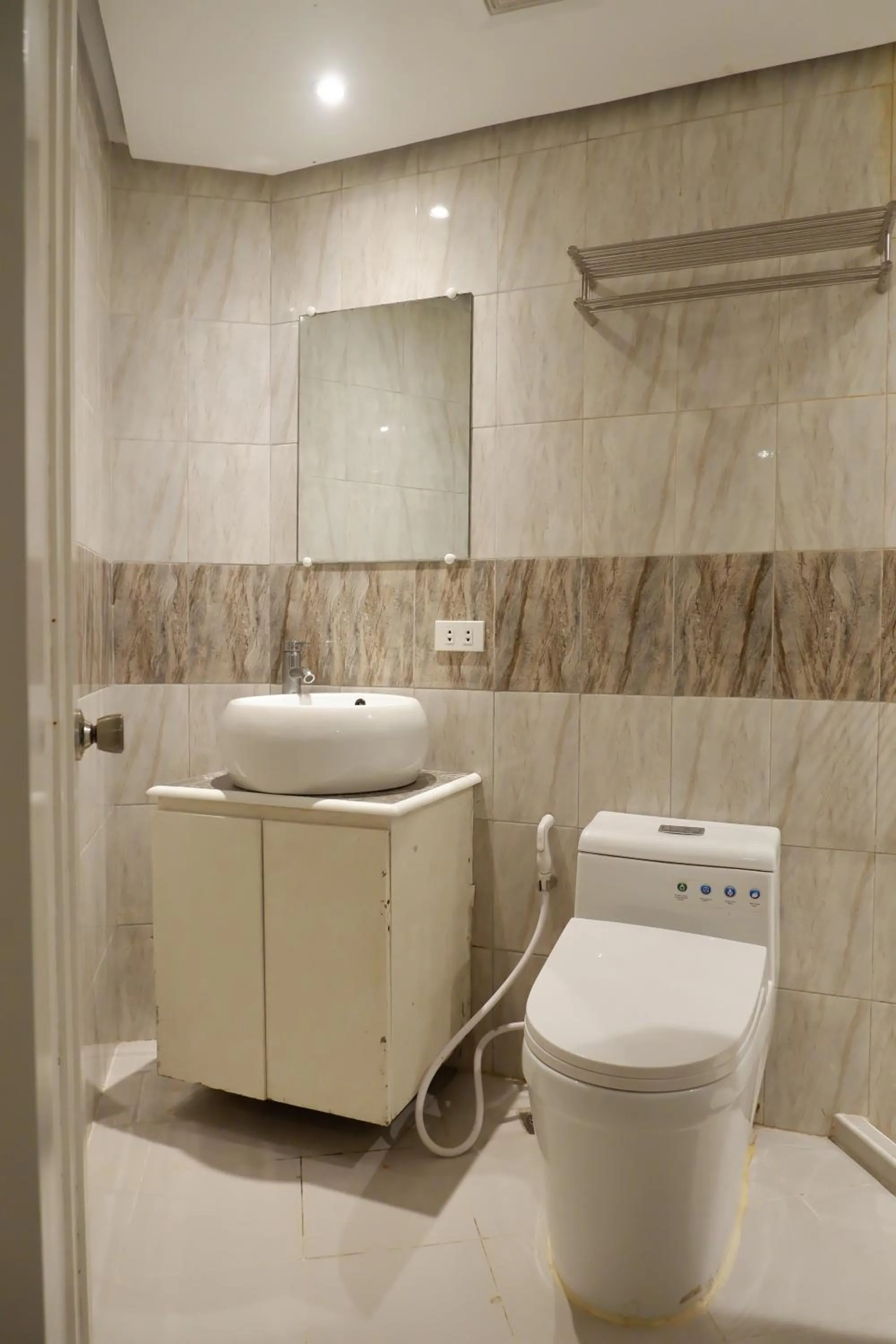 Toilet in Sunset View Ridge Residences