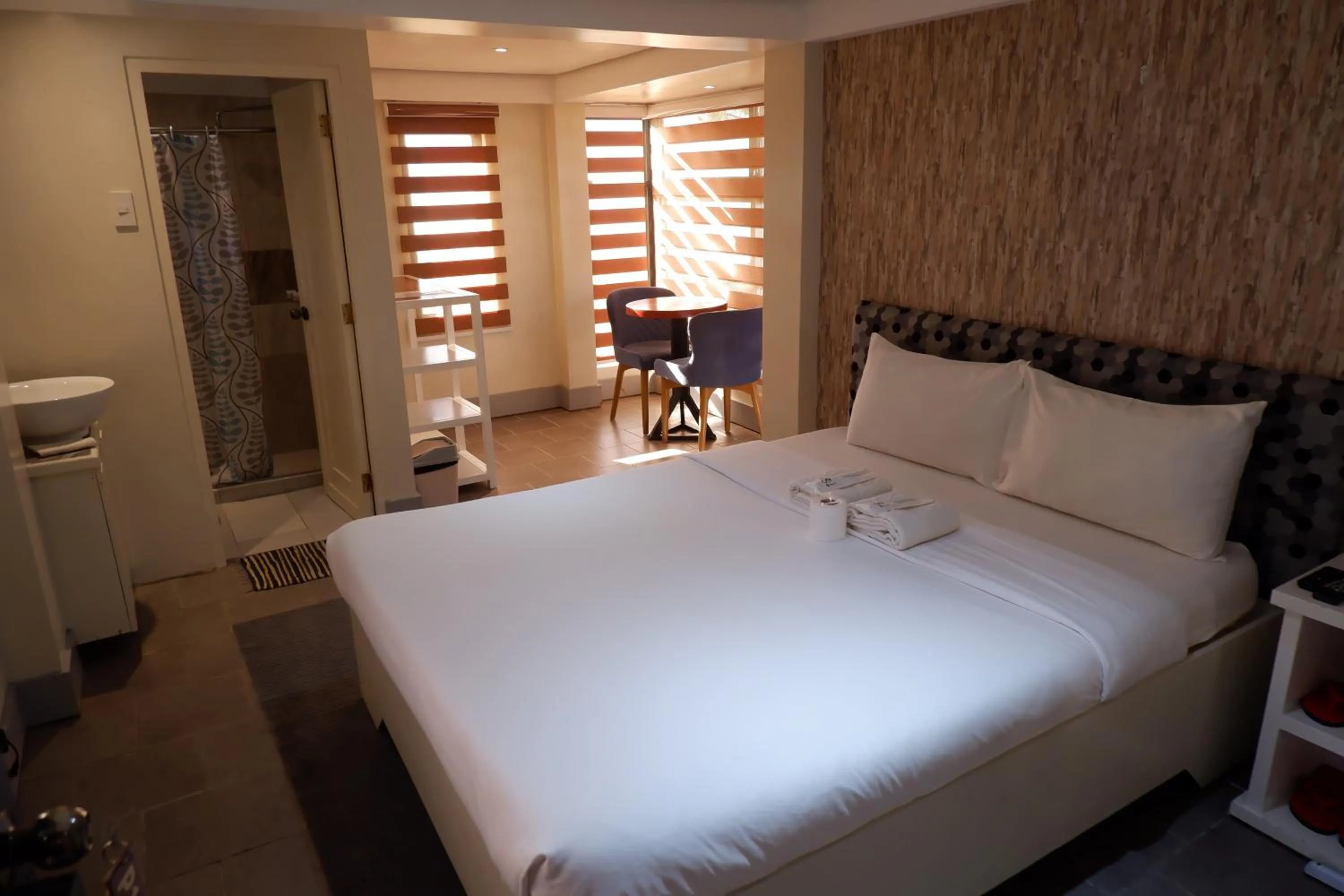 Bed in Sunset View Ridge Residences