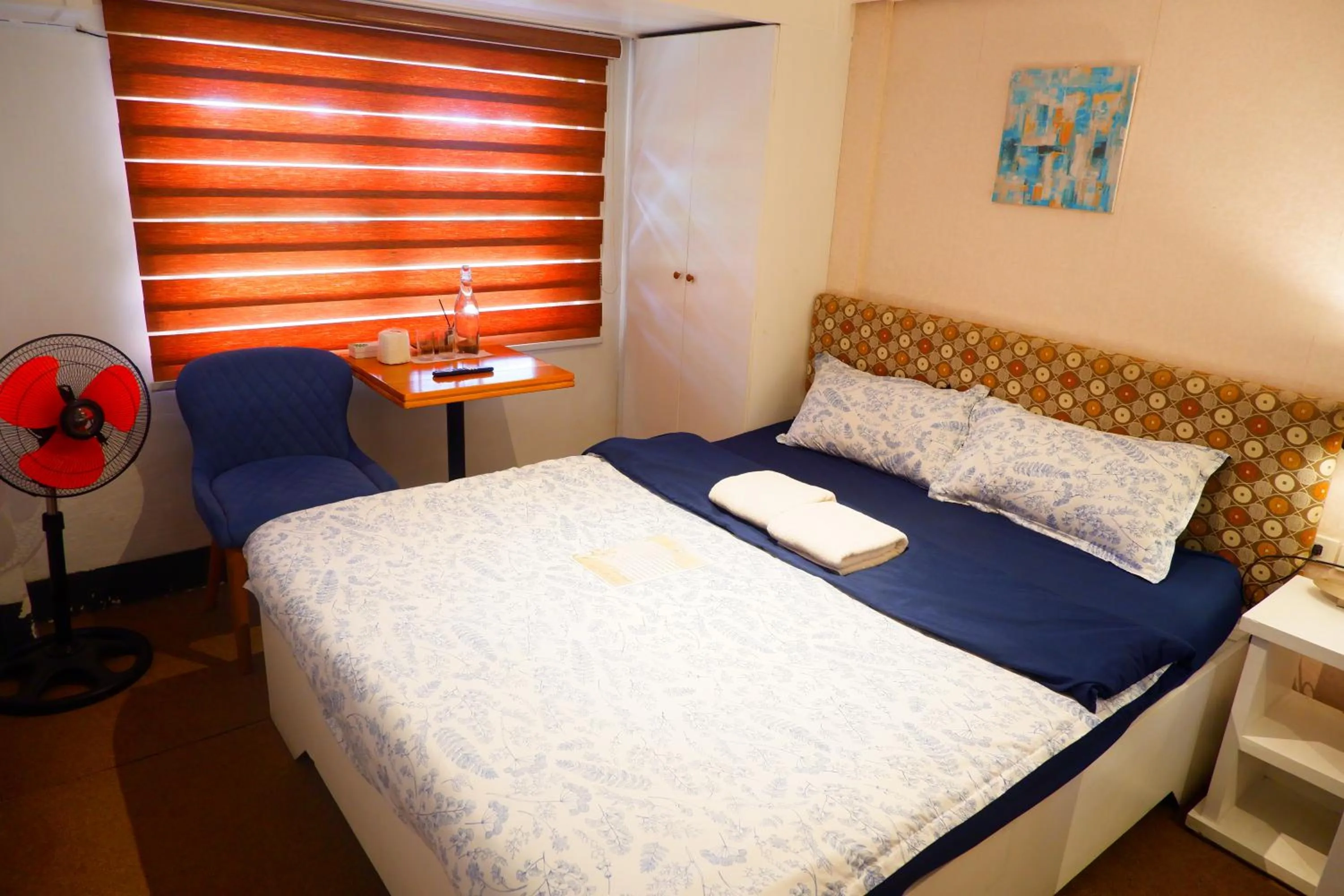 Bed in Sunset View Ridge Residences