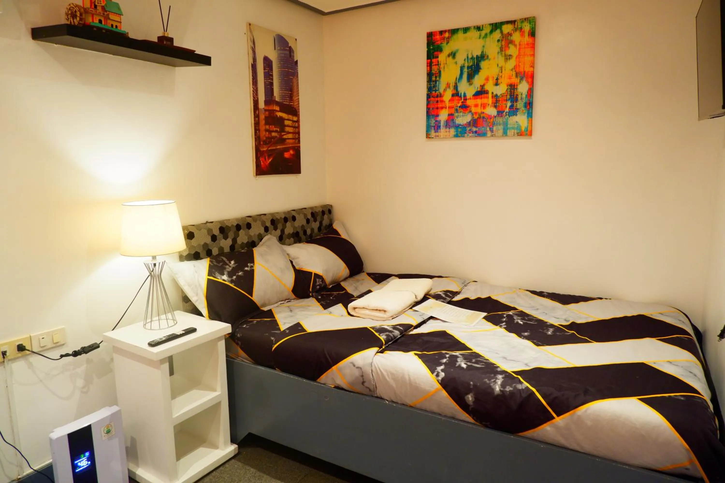 Bed in Sunset View Ridge Residences