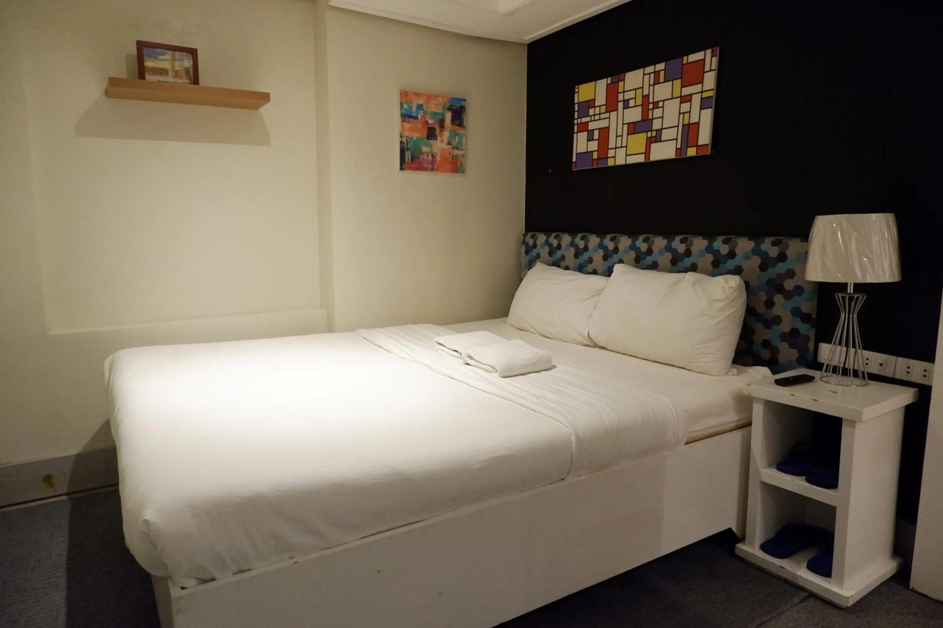 Bed in Sunset View Ridge Residences