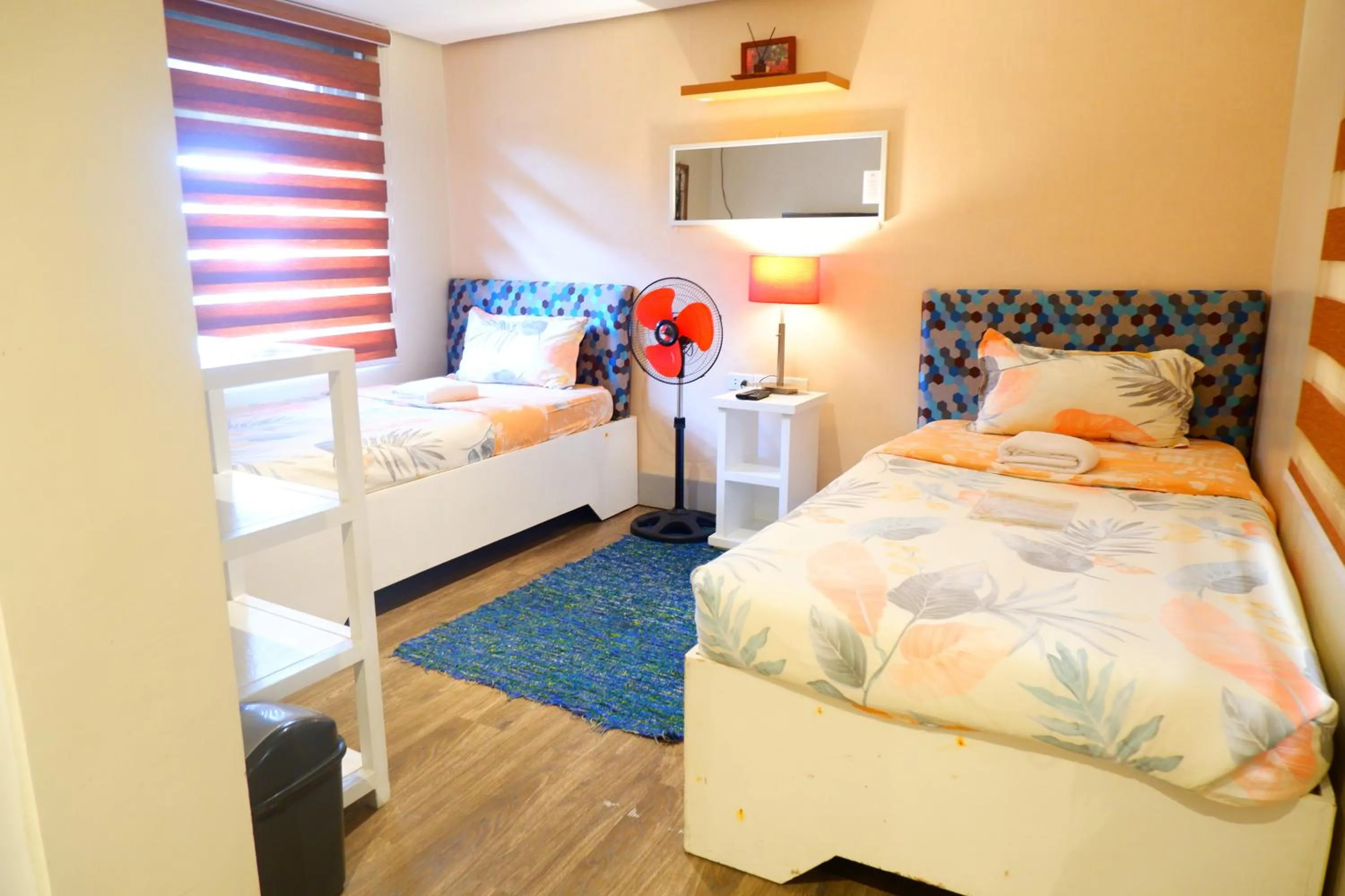 Bed in Sunset View Ridge Residences