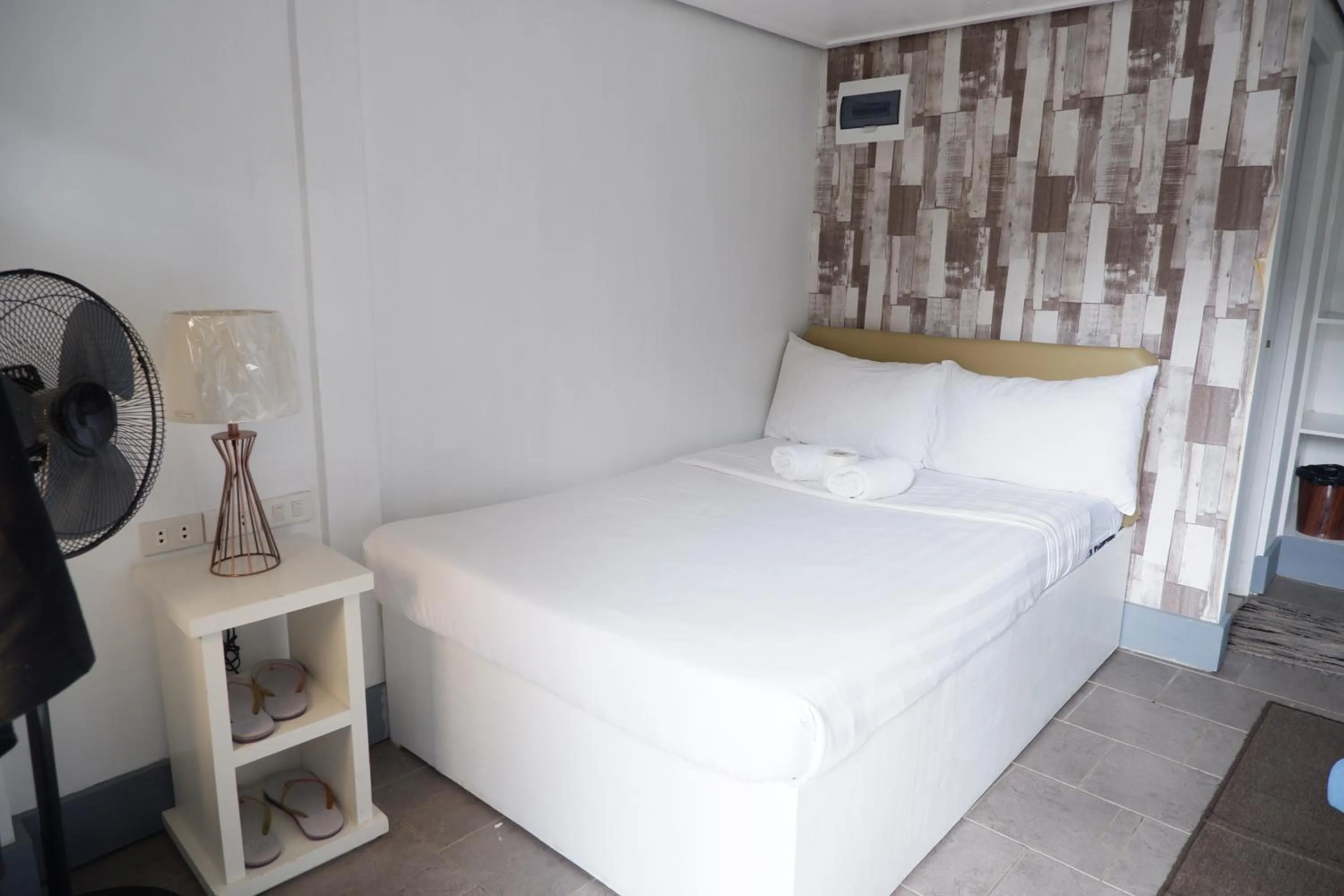 Bed in Sunset View Ridge Residences