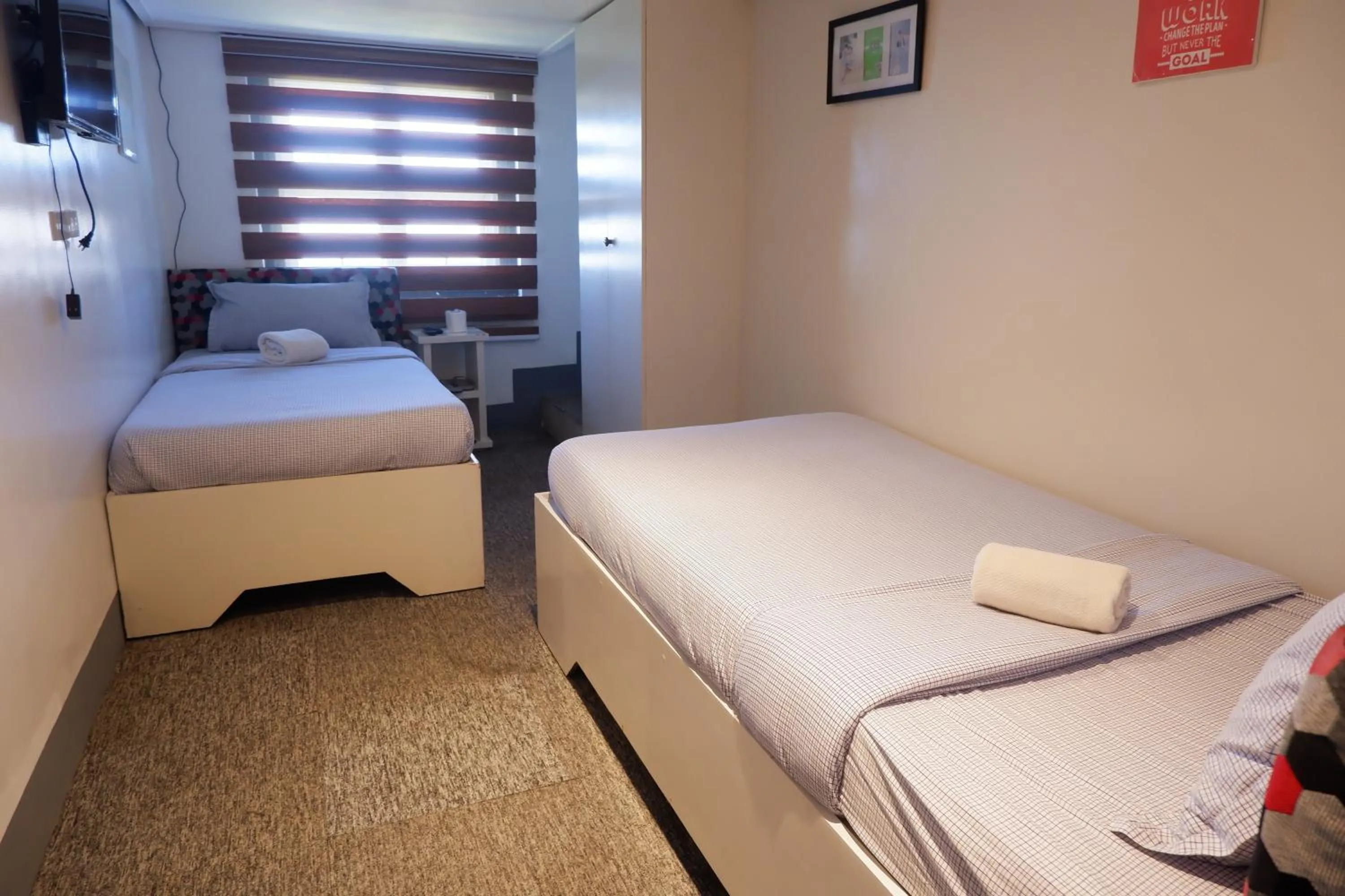 Bed in Sunset View Ridge Residences