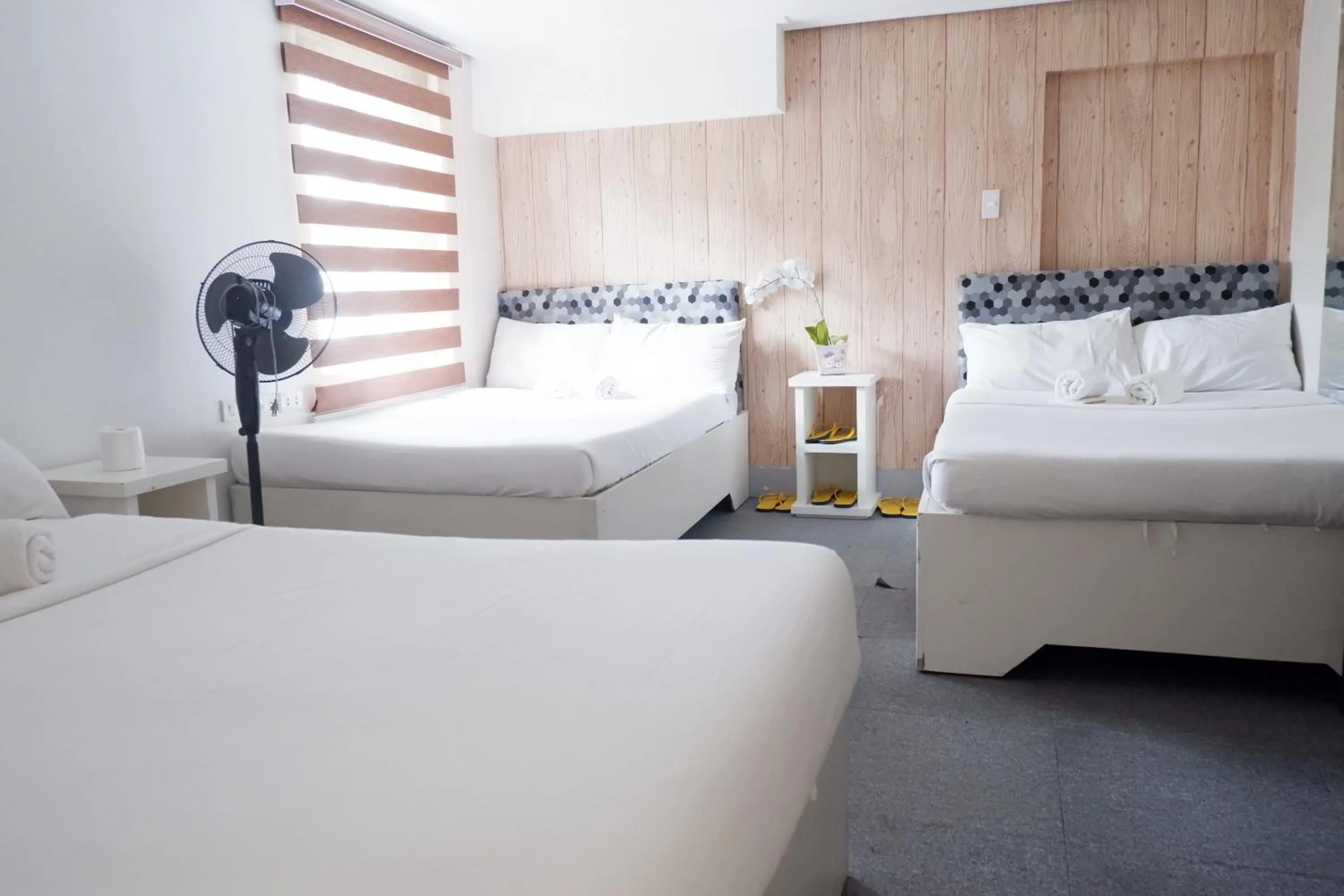 Bed in Sunset View Ridge Residences